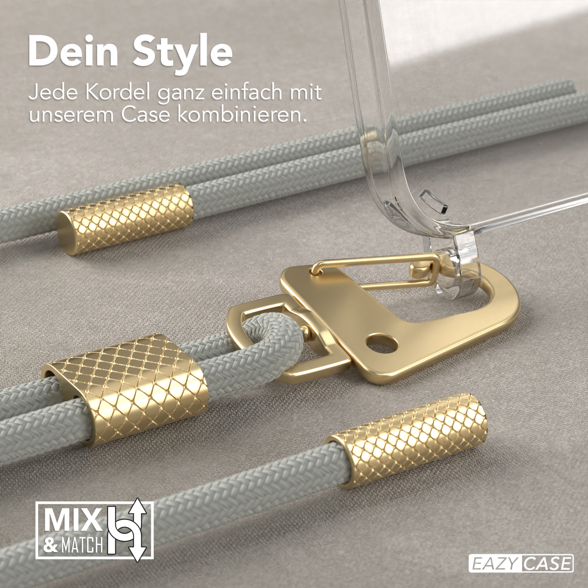 Nahaufnahme einer Telefonschnur mit goldenen Akzenten, durchsichtiger Handyhülle und grauem Hintergrund.