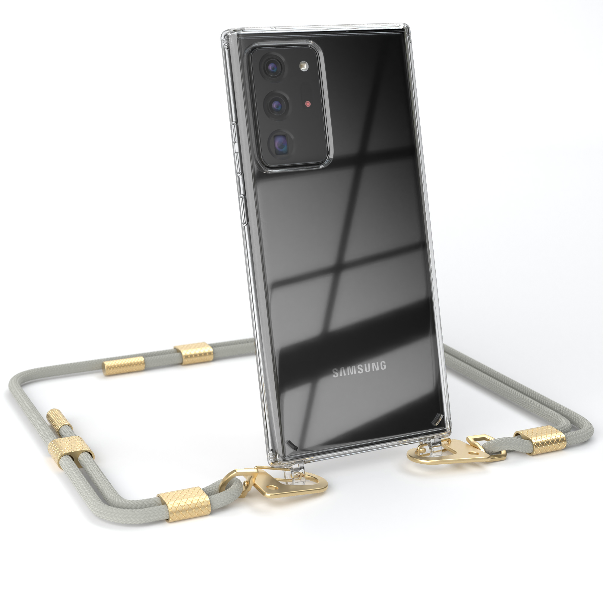 Transparente Handyhülle mit Handy und grauem Band. Band hat goldene Akzente und ist am Handy befestigt.