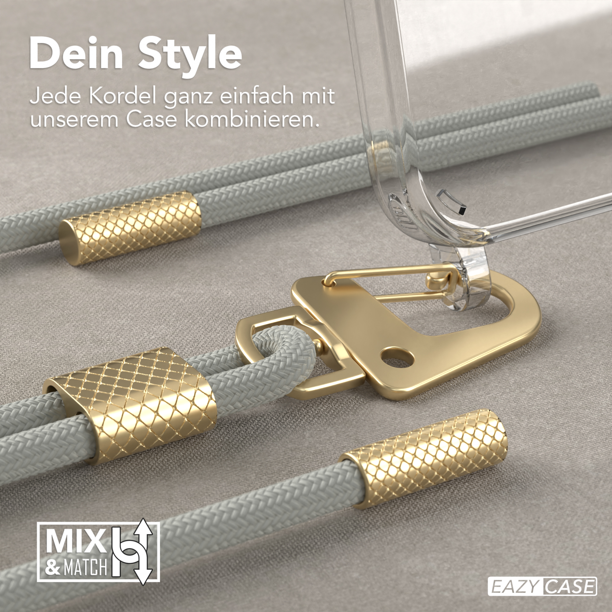 Nahaufnahme einer Handyhülle mit goldenen Akzenten, die Details der Hülle und des Kordels zeigt.