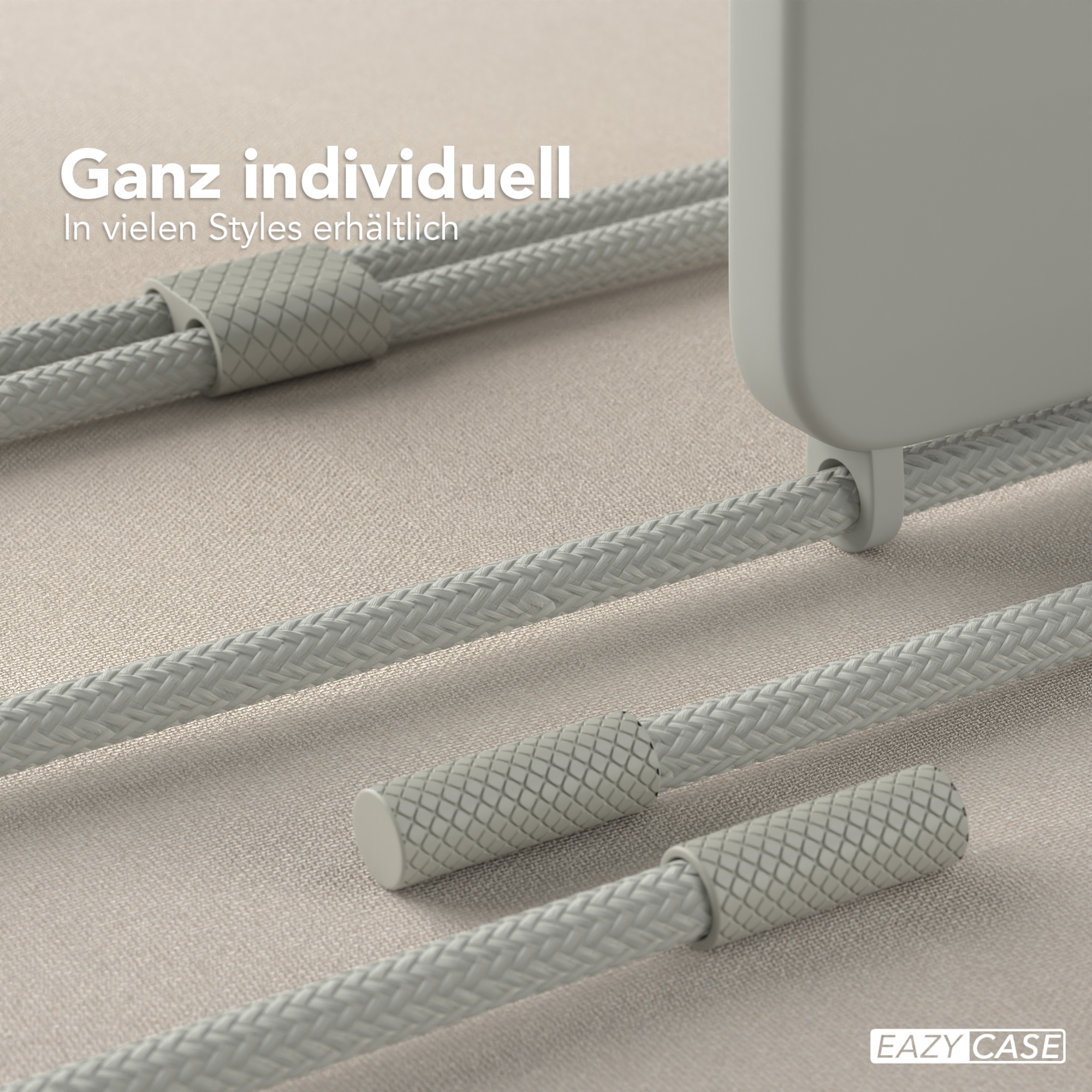 Geflochtene graue Telefon-Lanyard-Teile mit grauen Verschlüssen und grauem Hintergrund.