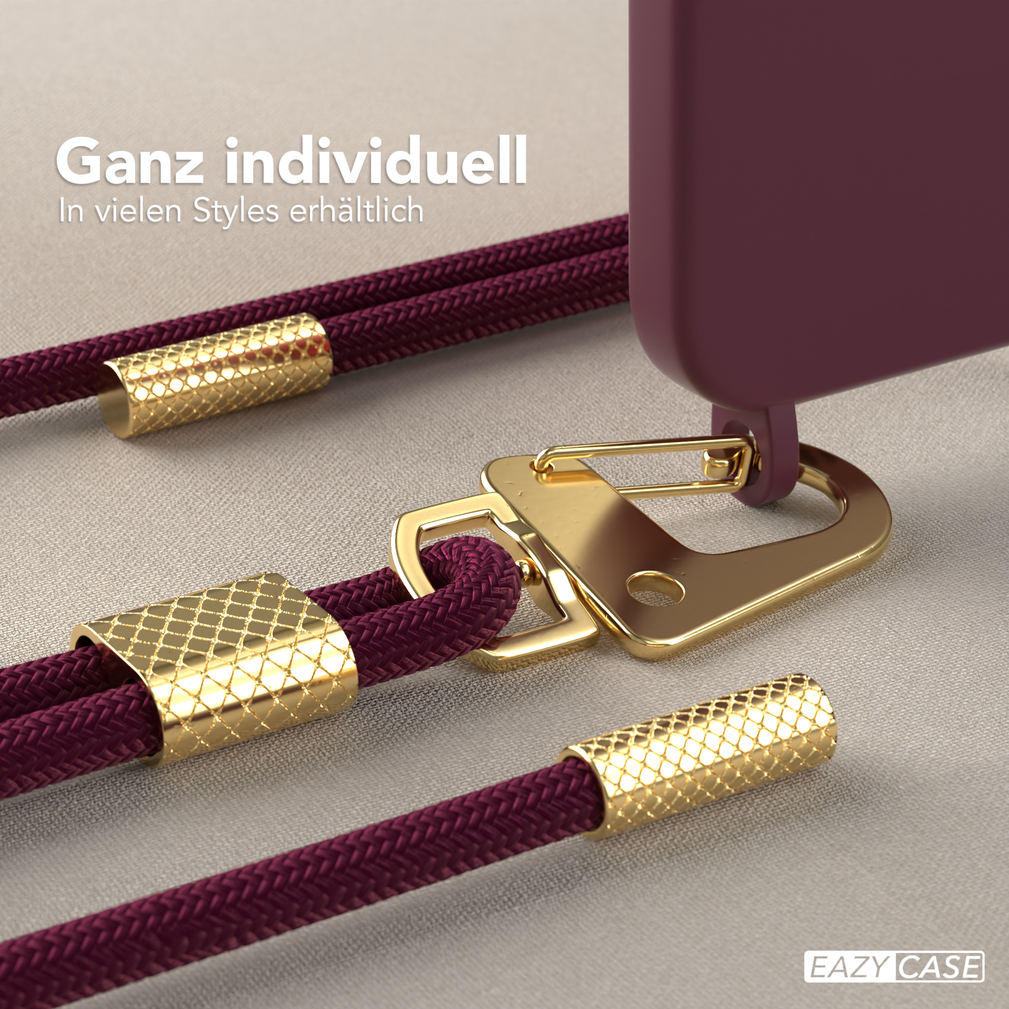 Eine Handyhülle mit einem befestigten Lanyard. Das Lanyard ist weinrot mit goldenen Akzenten.