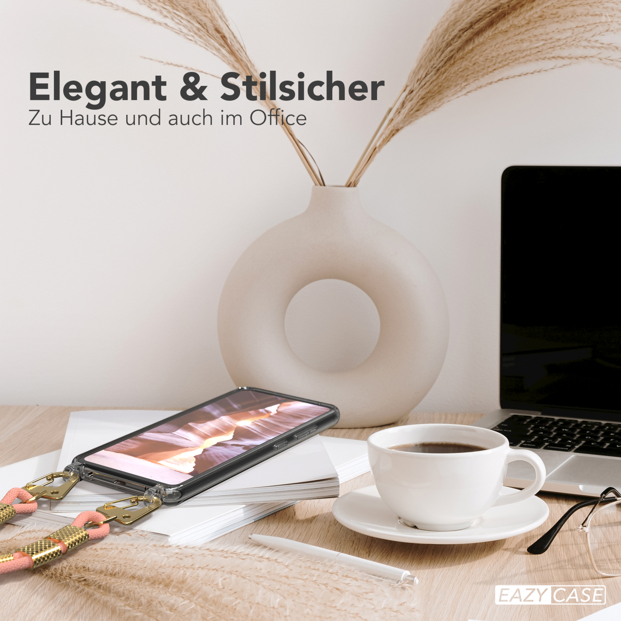Telefon auf dem Schreibtisch mit Kaffee, Laptop und Vase. Text: Elegant & Stilvoll.