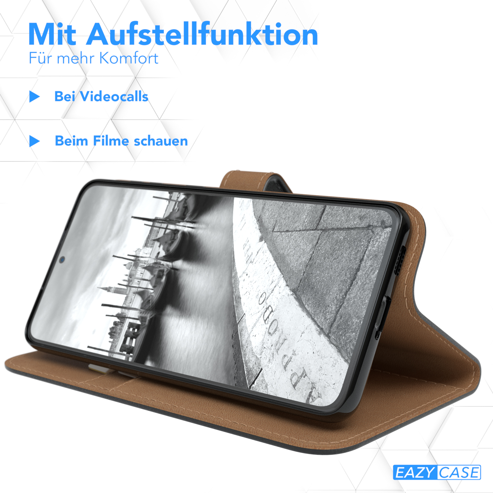 Ein Telefon in einer braunen Hülle, geöffnet, um den Bildschirm anzuzeigen, der eine Stadtszene zeigt.