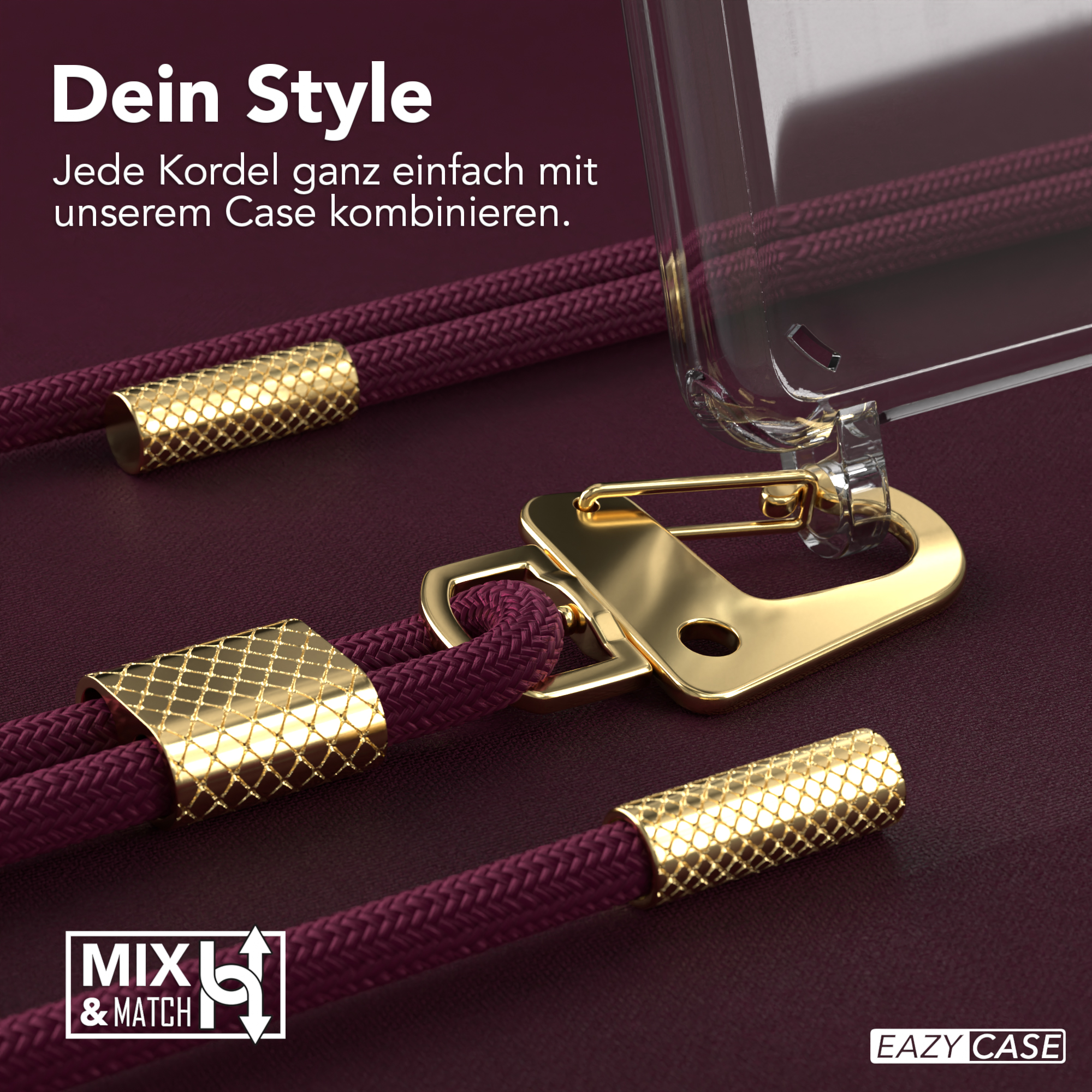 Nahaufnahme eines Schlüsselbands mit goldenem Verschluss und dekorativem Kordel auf dunkelrotem Hintergrund.