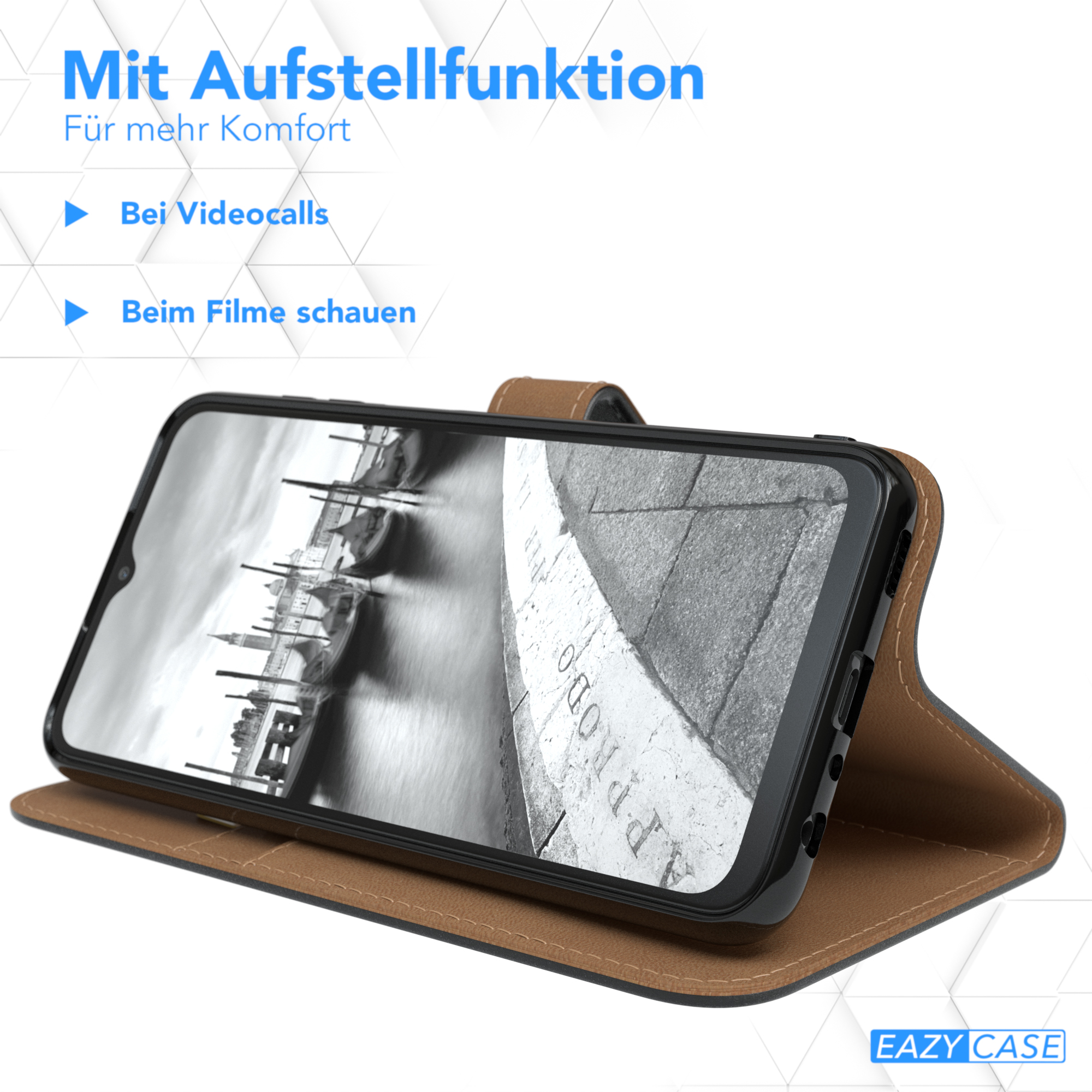 Telefon in brauner Hülle, geöffnet und aufgestellt, Stadtansicht zeigend.