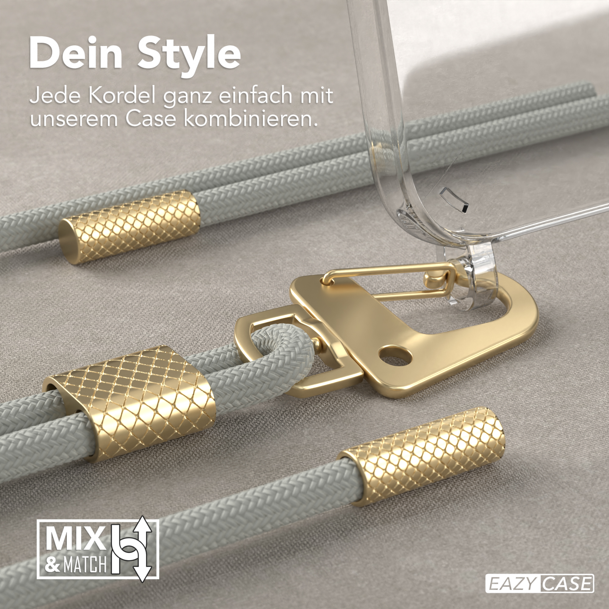Nahaufnahme von grauen geflochtenen Kordeln mit goldenen Akzenten. Eine transparente Handyhülle ist damit verbunden.