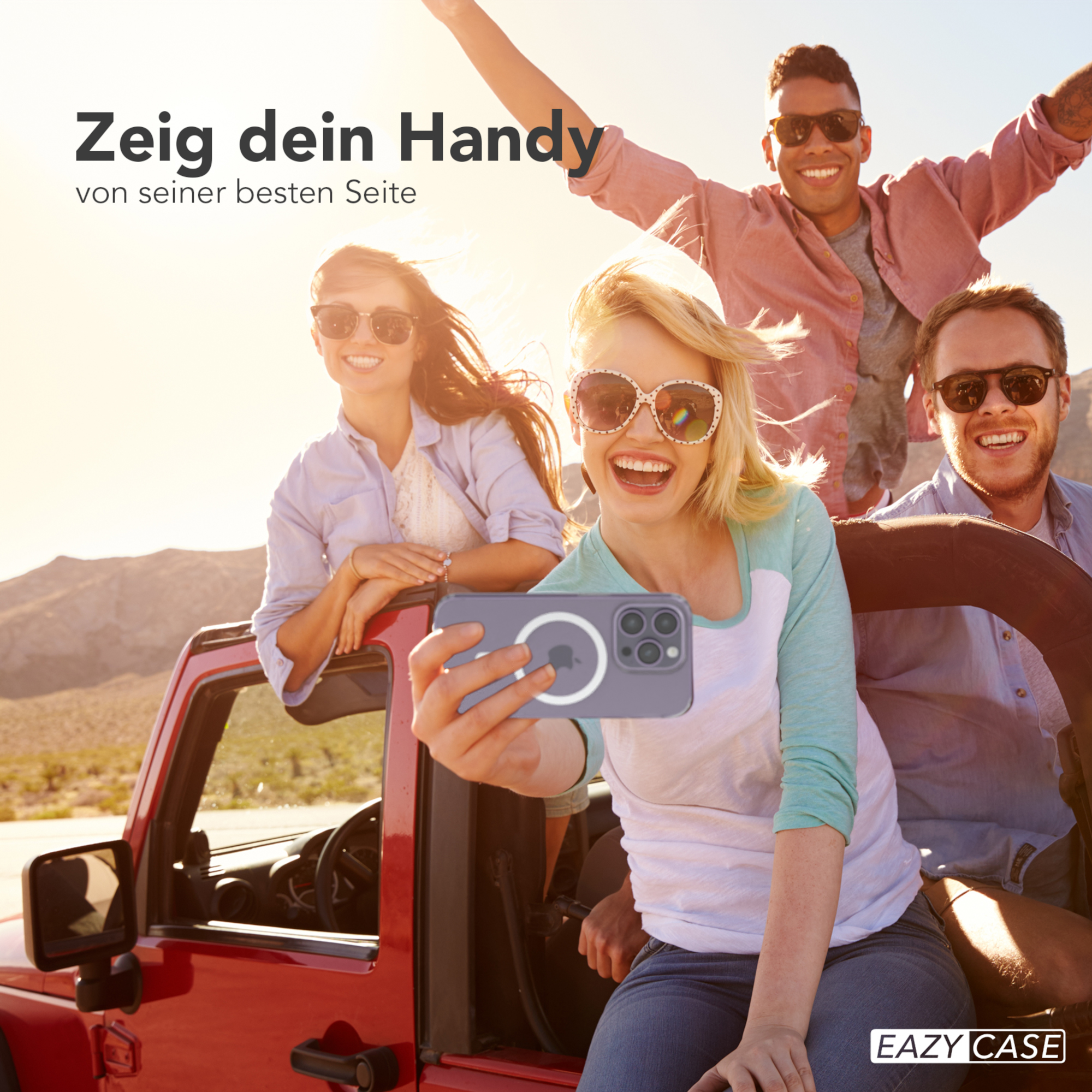 Gruppe von Leuten, die ein Selfie mit einem Telefon machen. Sie sind in einem roten Auto.