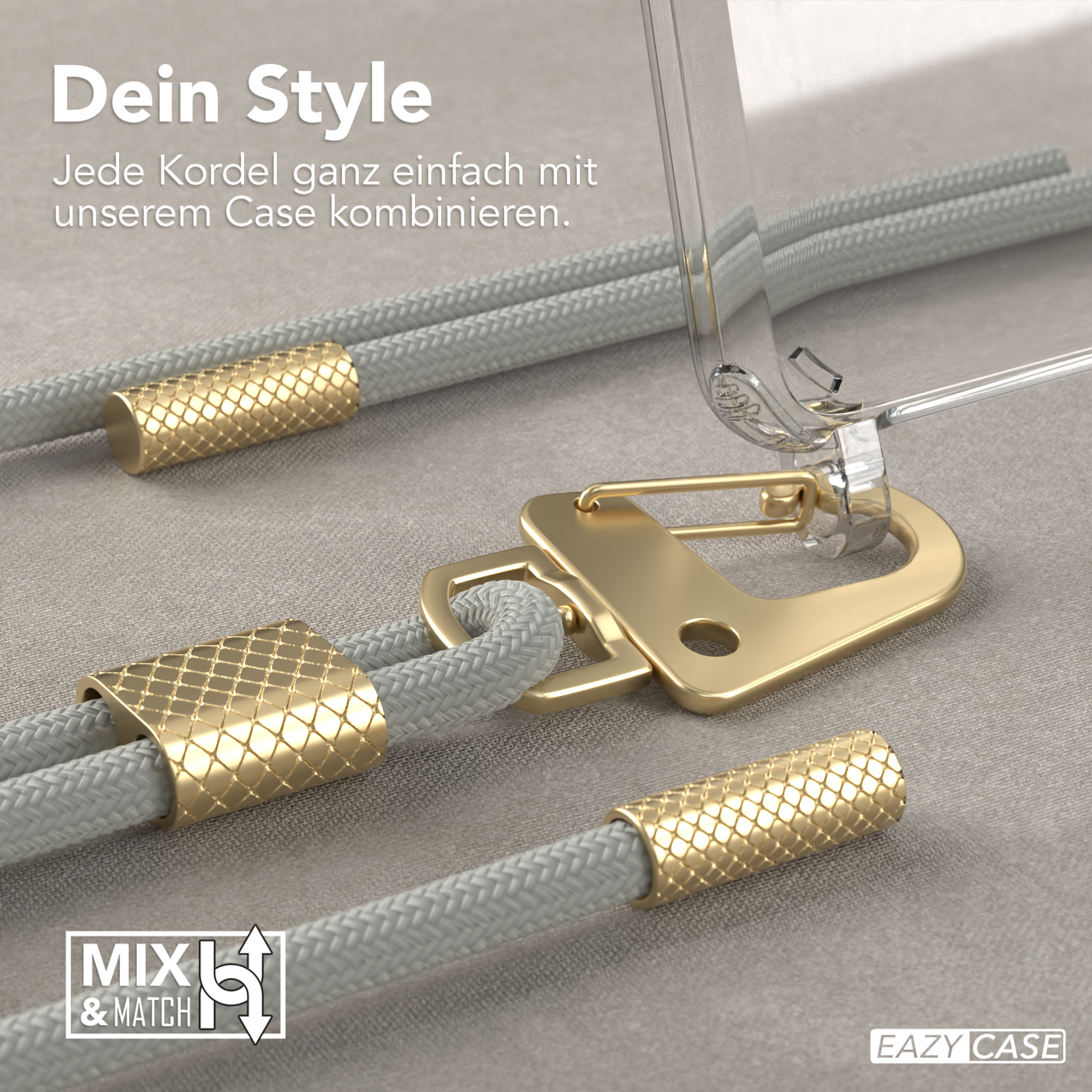 Nahaufnahme von grauen Handykordeln mit goldenen Akzenten und einer transparenten Handyhülle.