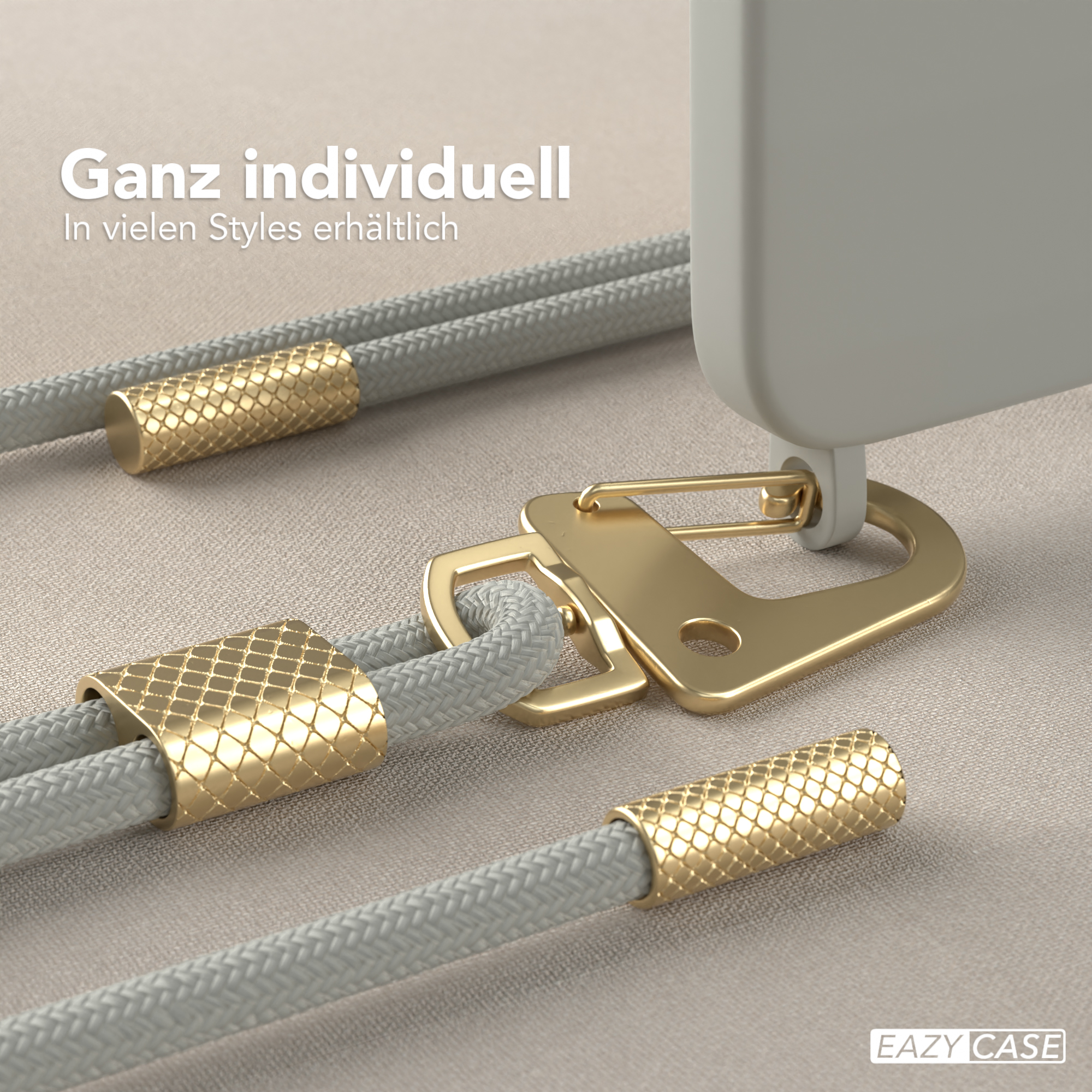 Graue Handyhülle mit goldfarbenem Schlüsselband. Das Schlüsselband hat ein gewebtes Muster und Metallverschlüsse.