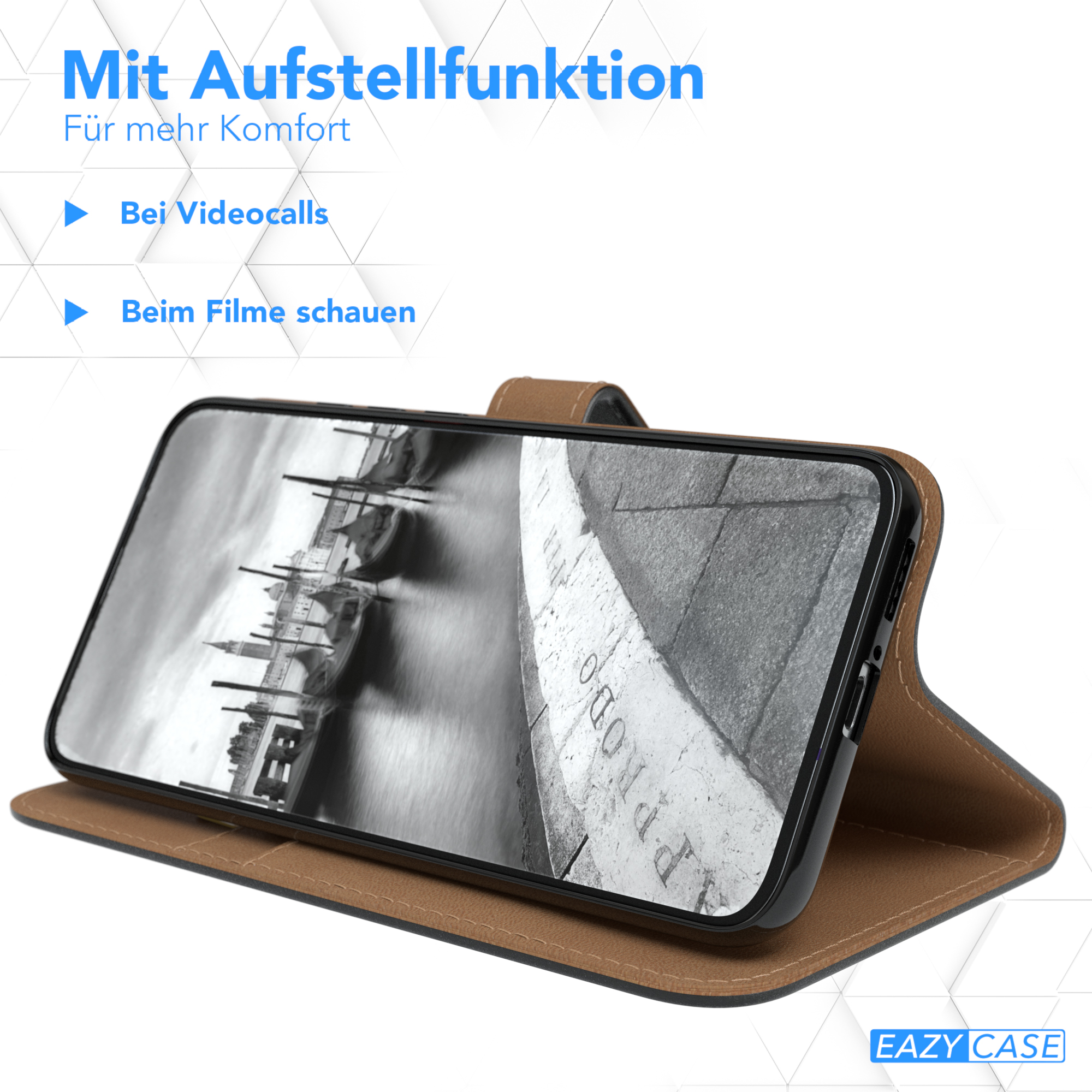 Telefon in brauner Hülle, zum Betrachten geneigt. Schwarz-Weiß-Bild auf dem Bildschirm.