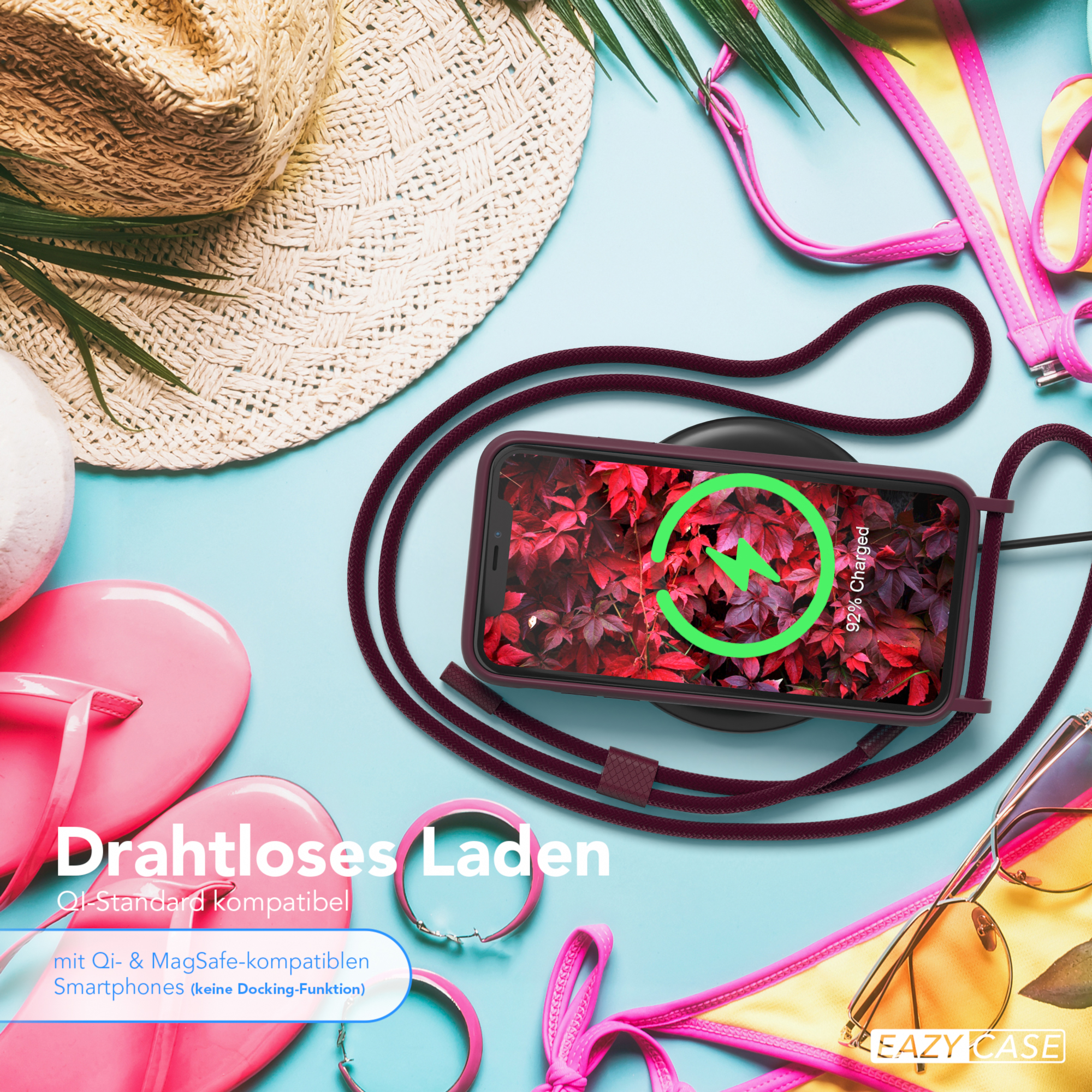 Telefon lädt kabellos mit floralem Hintergrund. Das Telefon zeigt ein Ladesymbol.