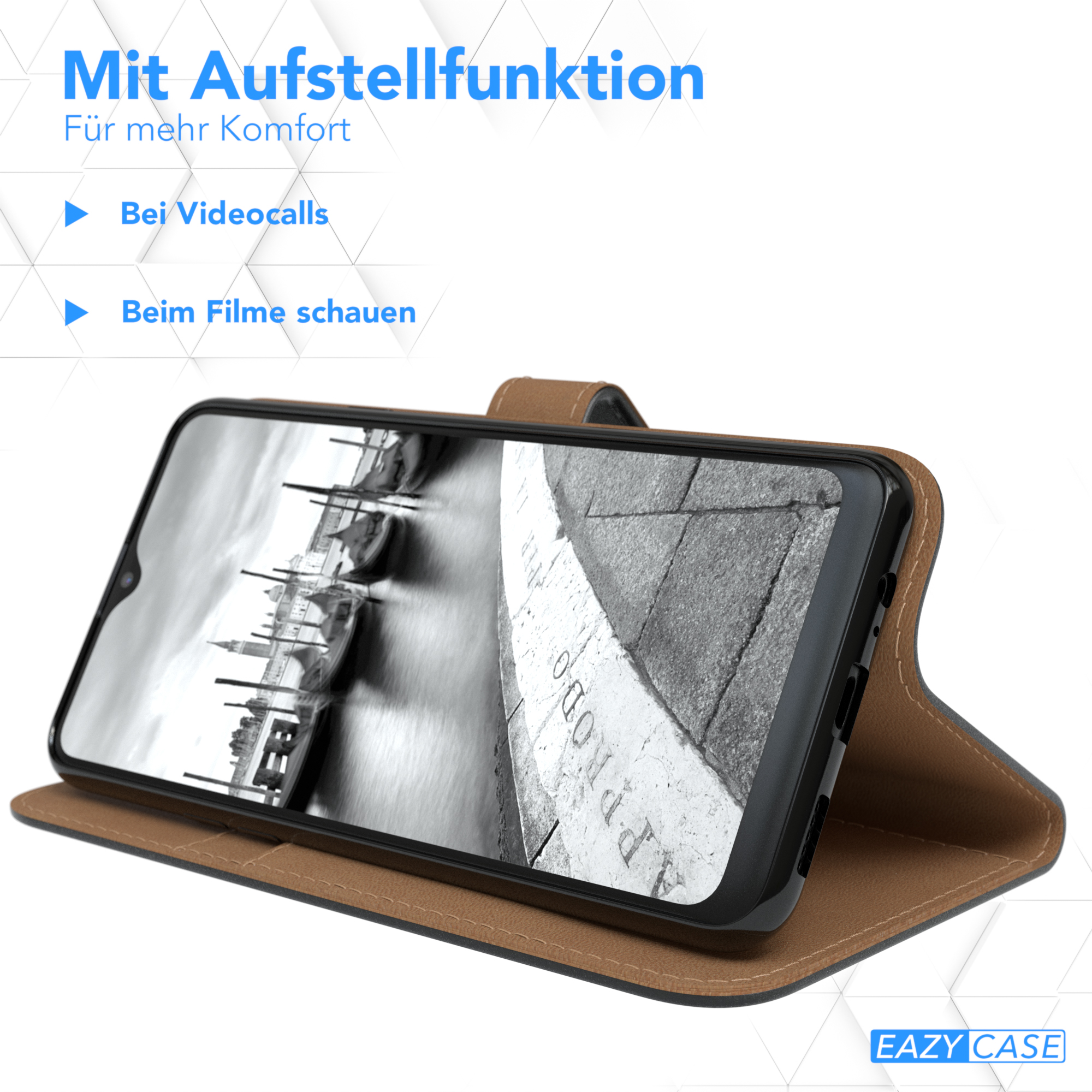 Telefon in brauner Hülle, offen, Stadtansicht auf dem Bildschirm. Text oben.