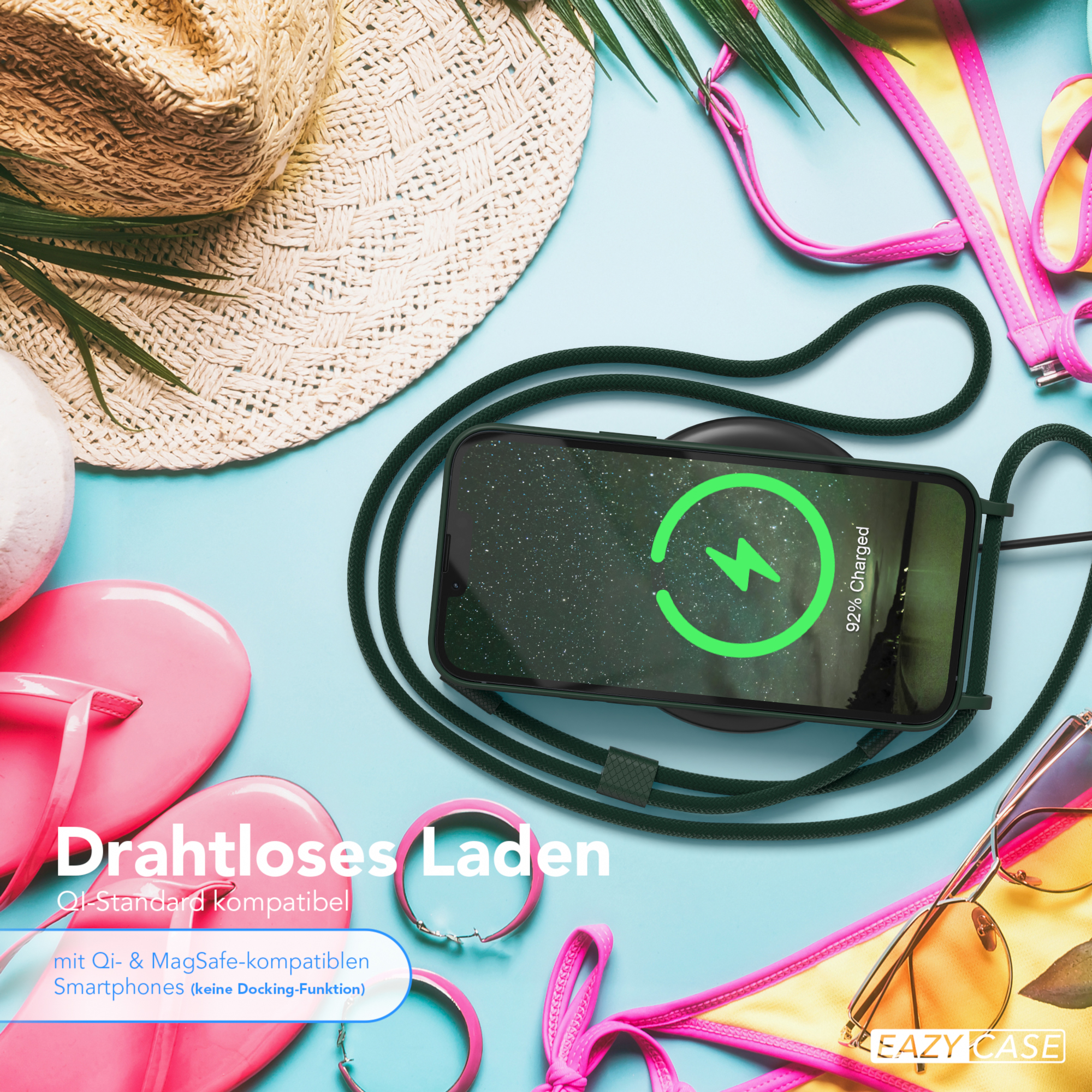 Ein Telefon auf einem kabellosen Ladegerät. Ein Hut, Flip-Flops und eine Sonnenbrille sind zu sehen. Ein Bikini ist im Hintergrund.