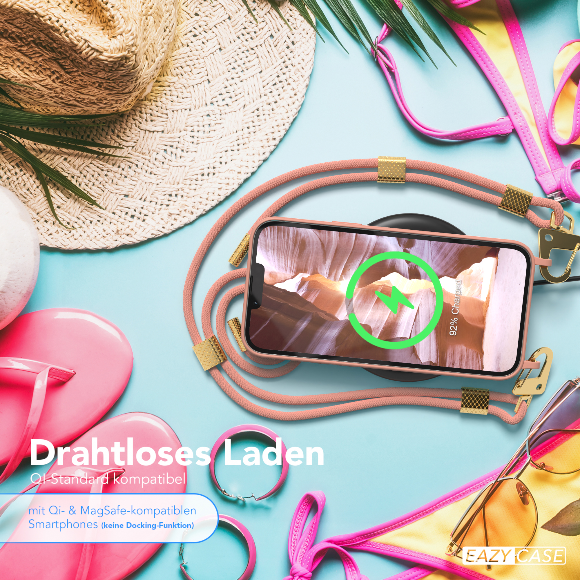 Telefon lädt kabellos, mit pinkem Band. Strand-Thema: Sonnenbrille, Hut.