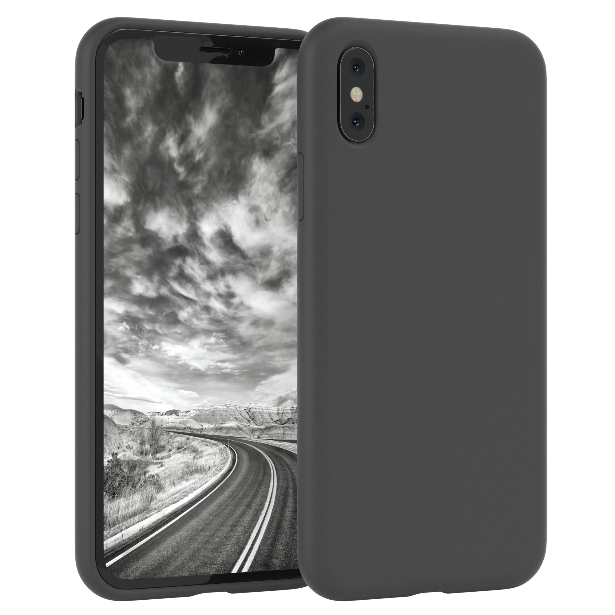 Dunkelgraues Telefon in Hülle, mit Kameralinse. Schwarz-weißer Landschaftshintergrund.