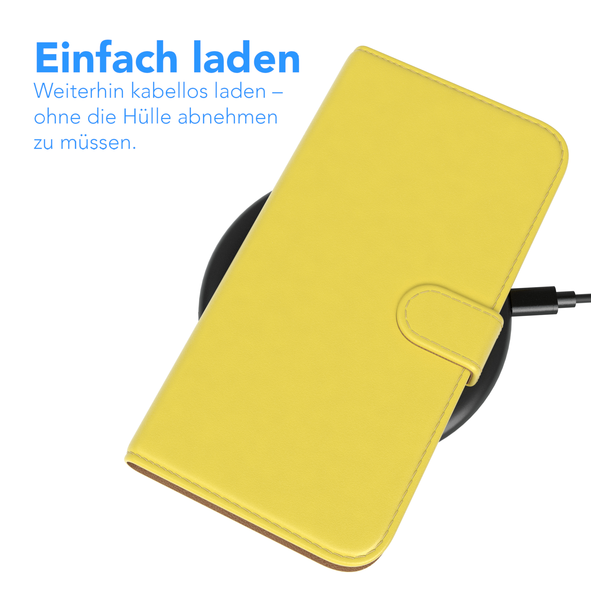 Eine gelbe Handyhülle liegt auf einem schwarzen kabellosen Ladegerät. Die Hülle ist geöffnet und liegt flach.