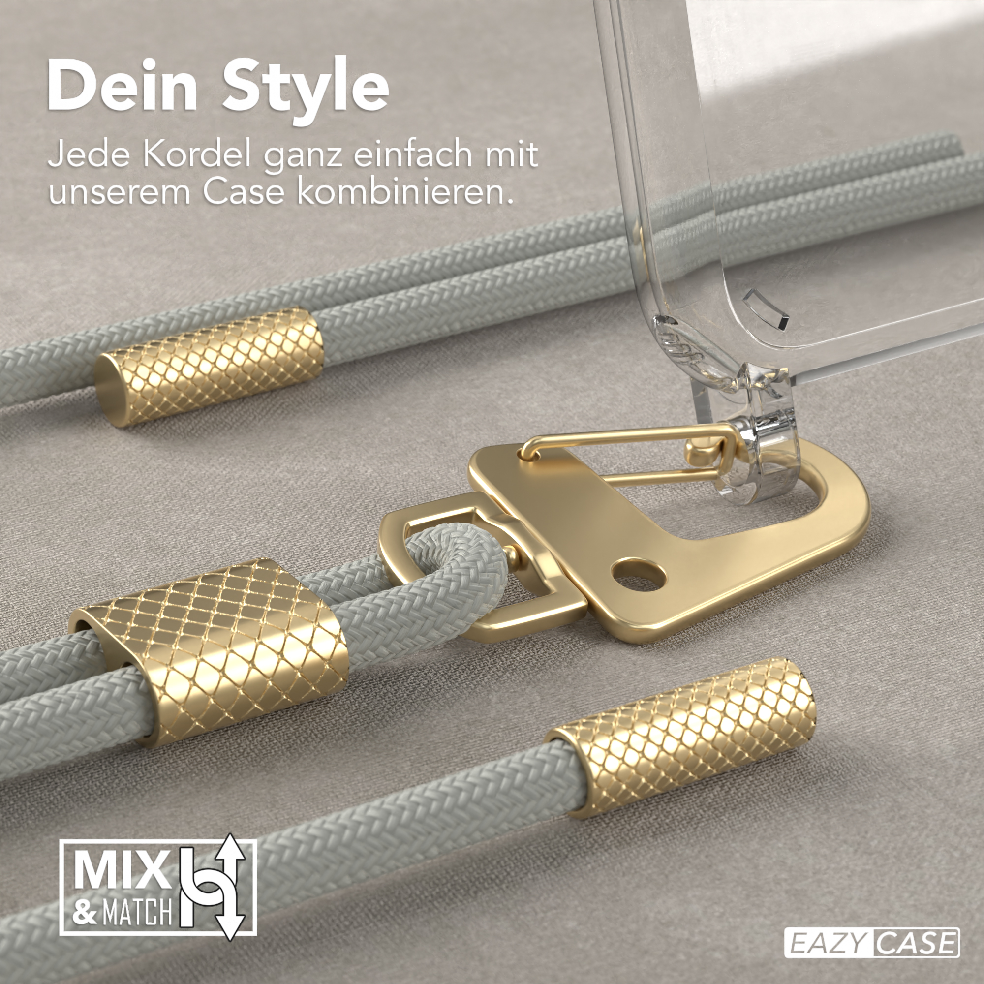 Nahaufnahme von Handyriemen-Teilen, goldene Details. Zwei graue Kordeln, goldene Akzente, eine klare Handyhülle.
