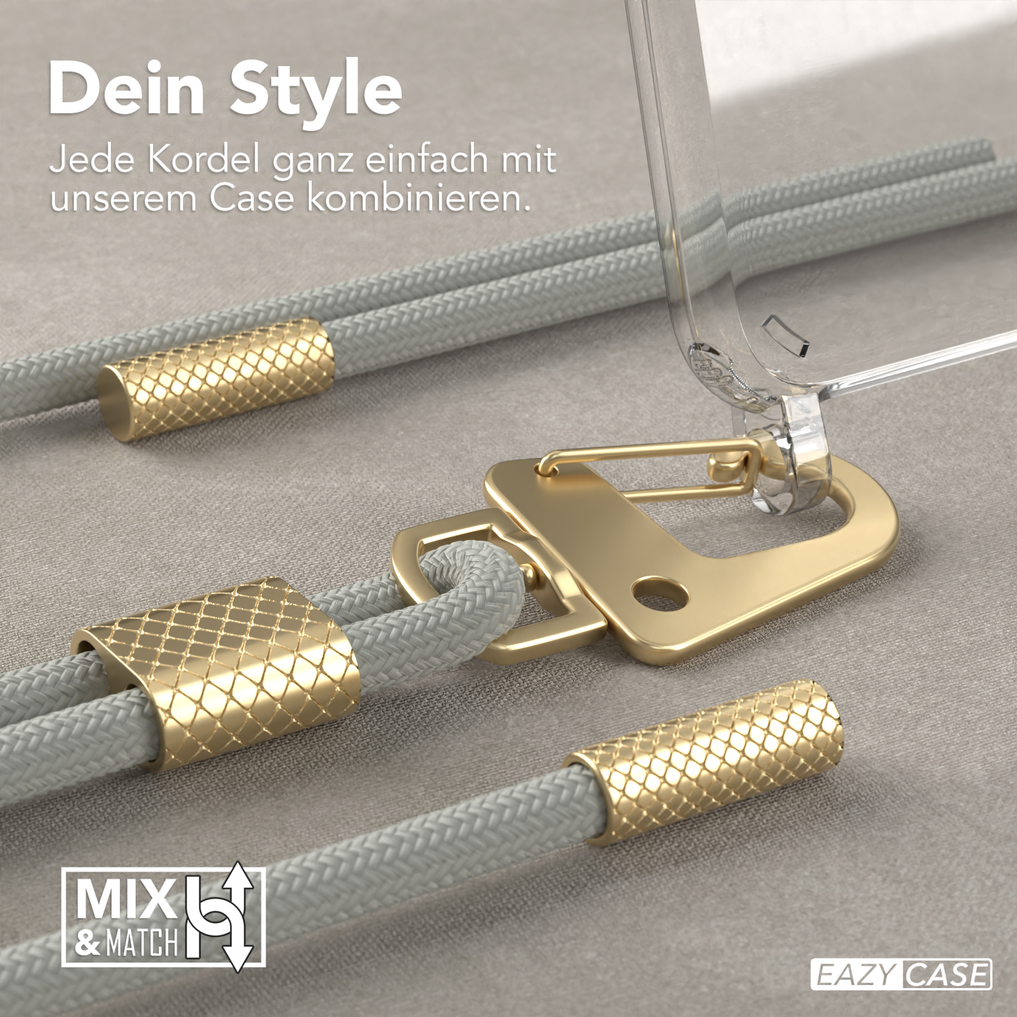 Graue Kordeln mit goldenen Akzenten und eine transparente Handyhülle. Die Hülle ist an den Kordeln befestigt.