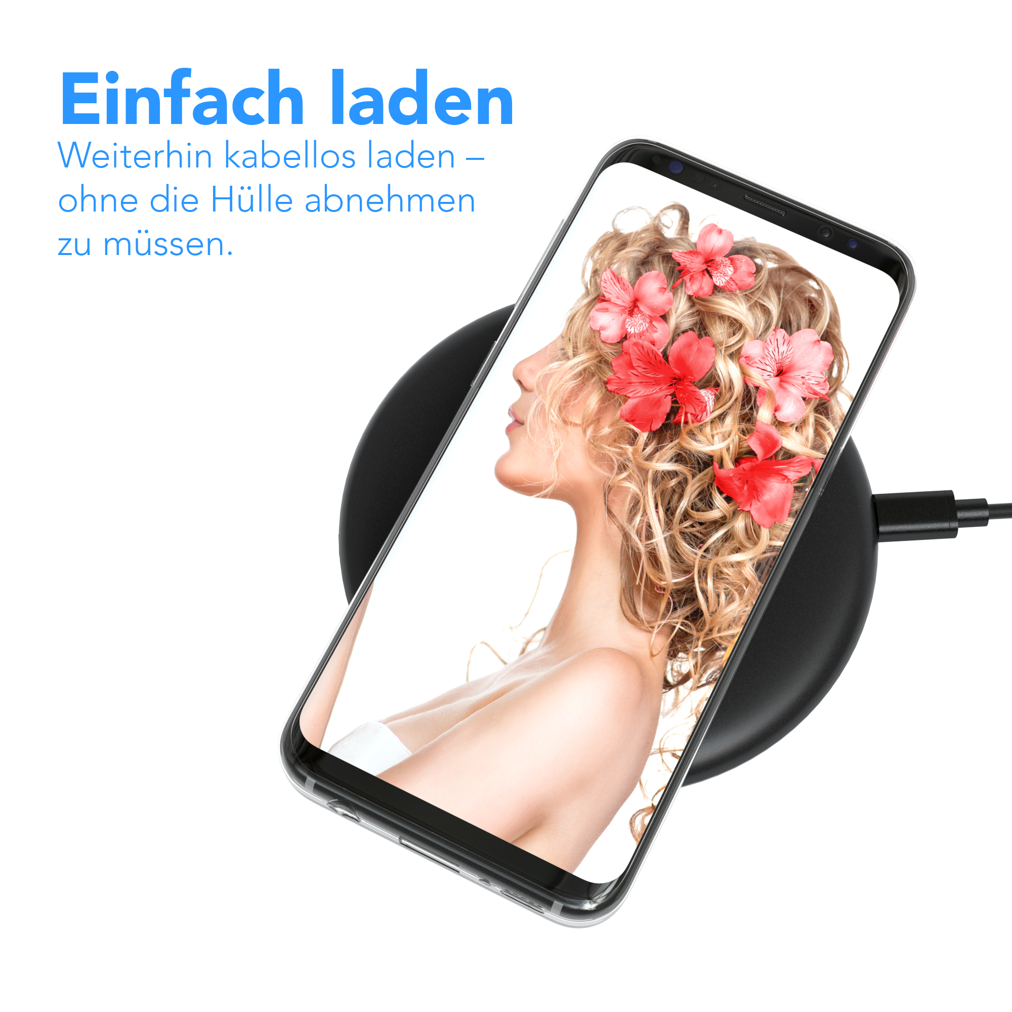 Telefon auf Ladegerät, Haare mit roten Blumen. Schwarzes Ladegerät, weißer Hintergrund, Text oben.