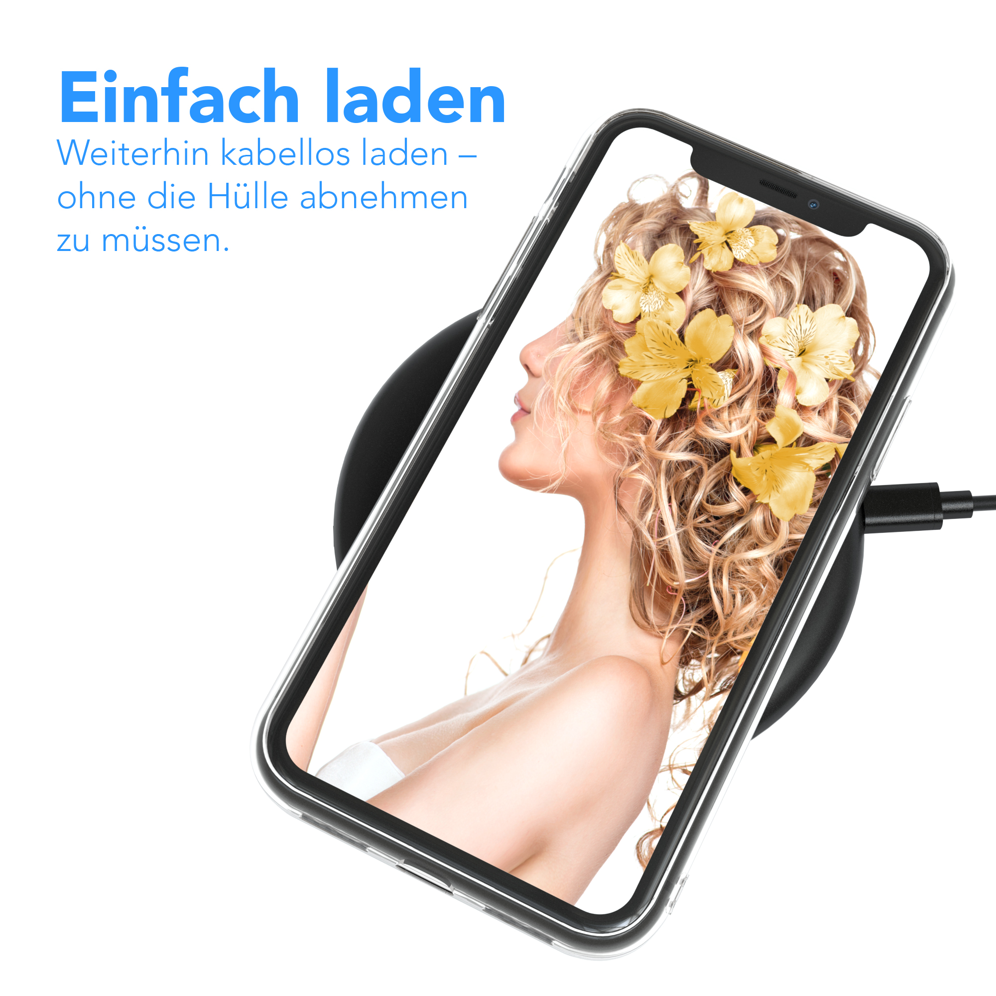 Frau mit Blumen auf dem Kopf, Telefon auf kabellosem Ladegerät. Ladesymbol auf dem Telefon.