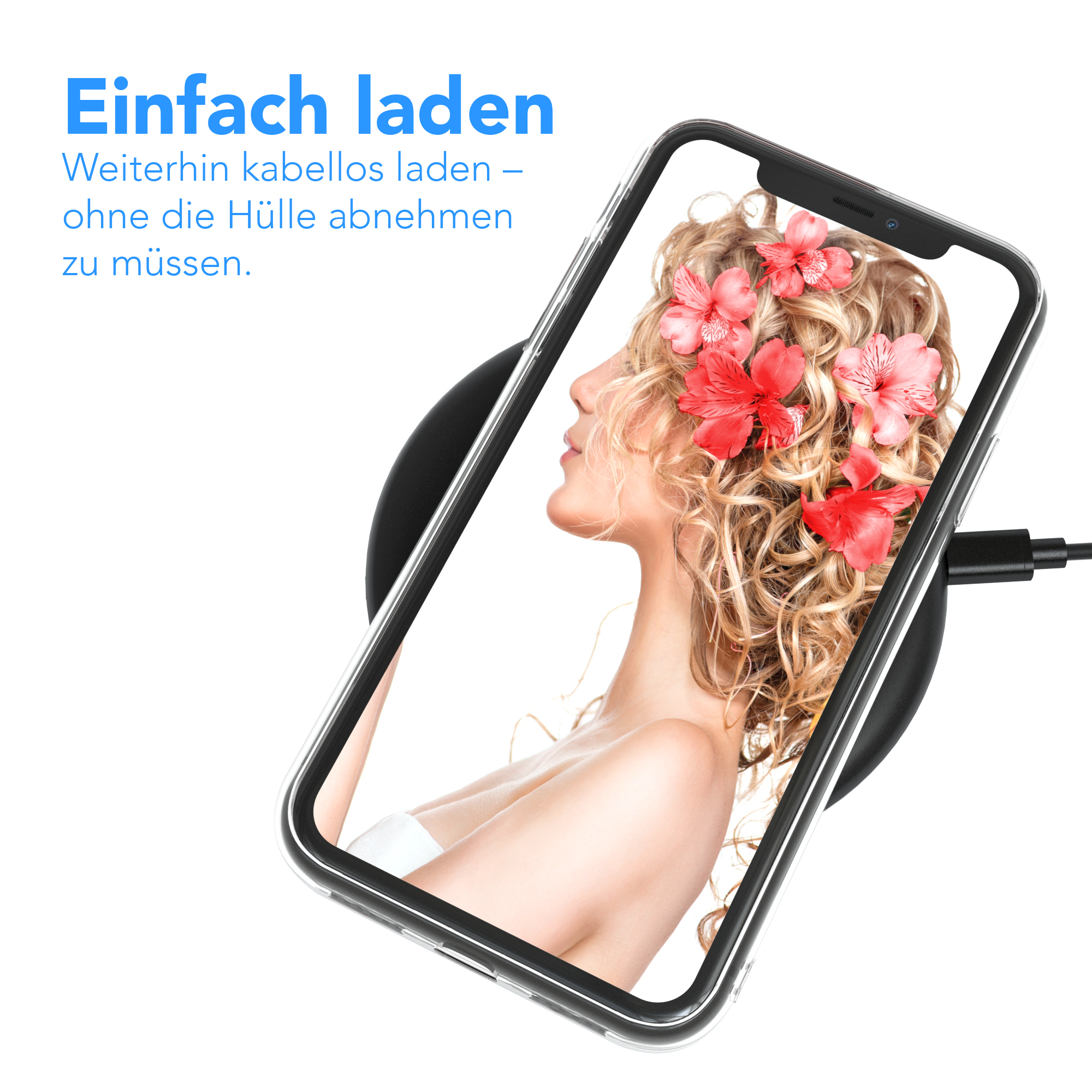 Ein Telefon mit Blumen auf dem Bildschirm liegt auf einem kabellosen Ladegerät. Das Telefon befindet sich in einer transparenten Hülle.