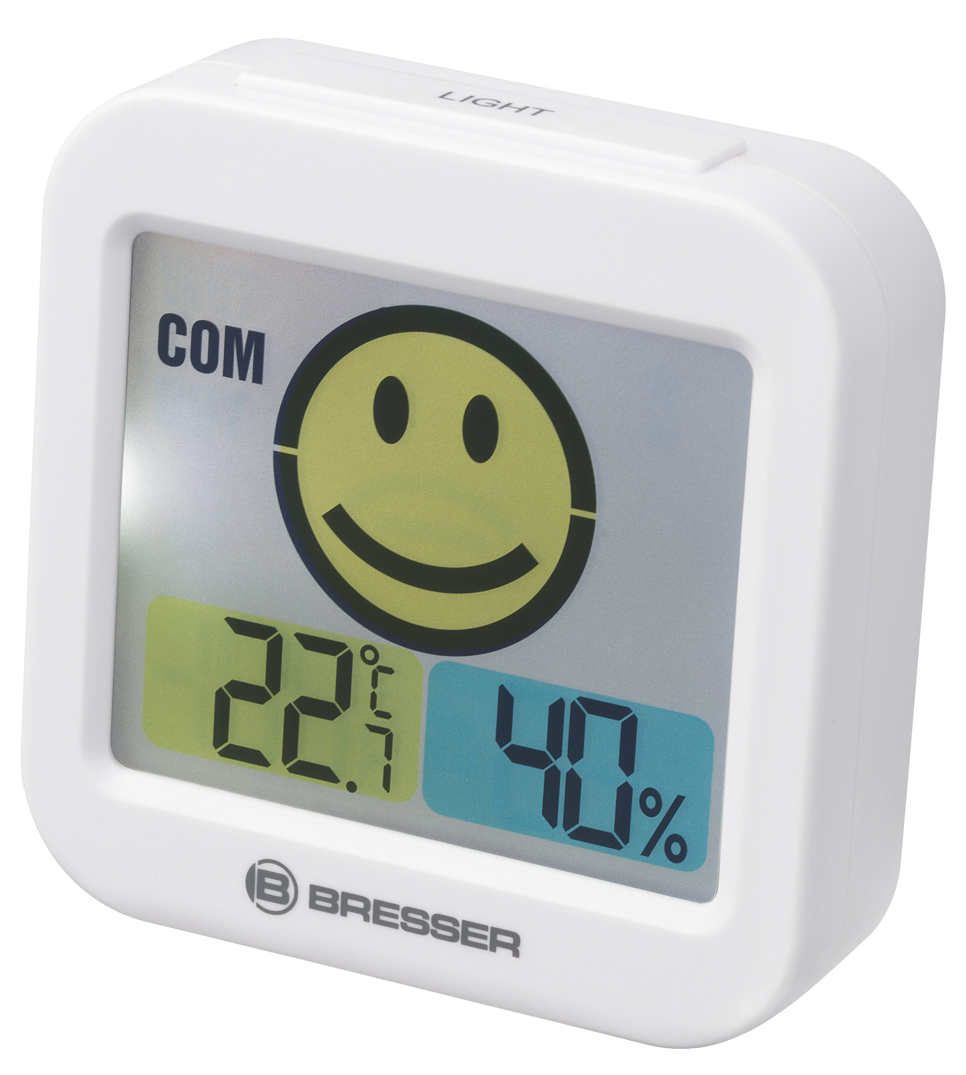 Termómetro digital blanco con pantalla de carita sonriente que muestra temperatura y humedad.