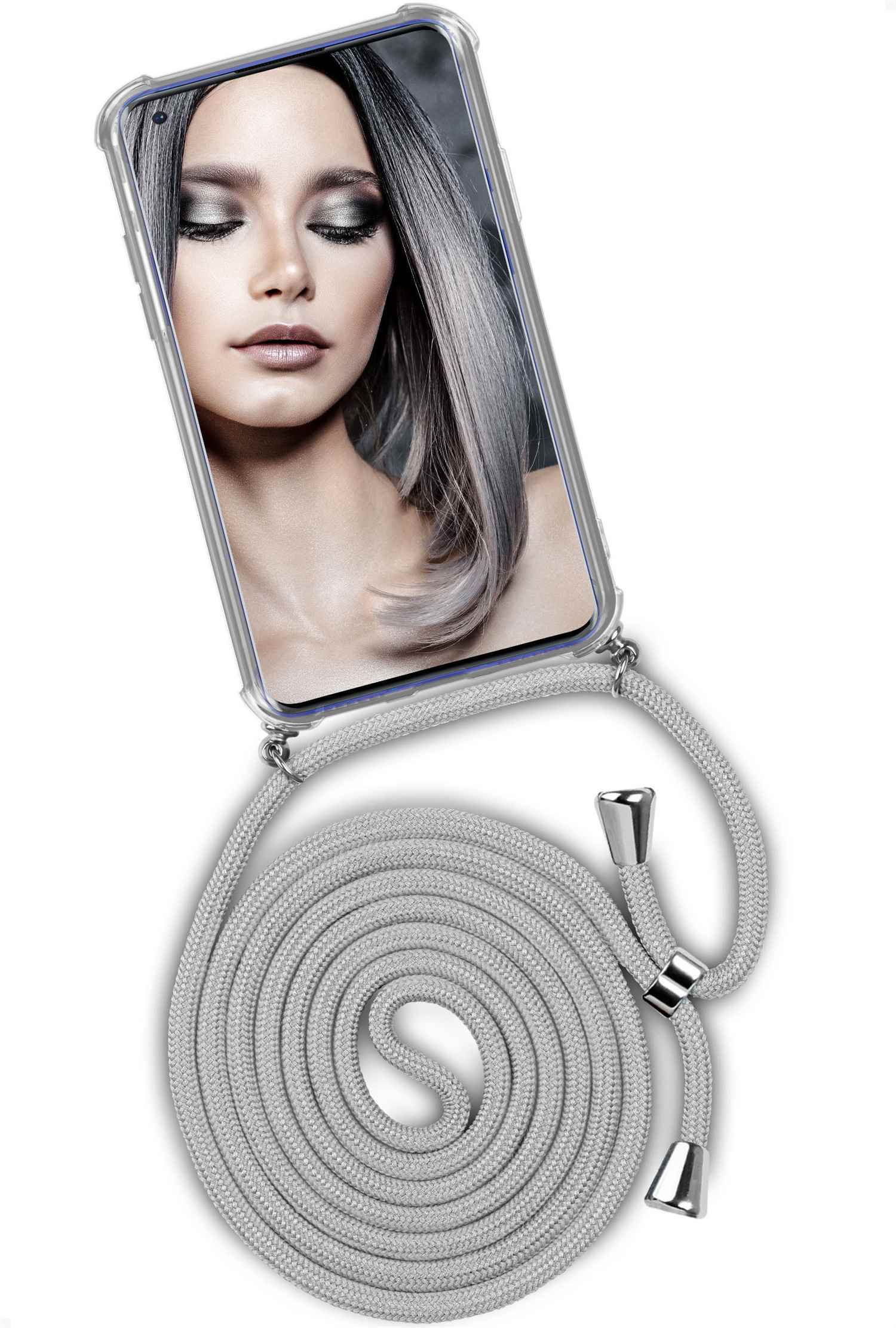 Telefon mit Frauengesicht und grauem Umhängeband. Die Frau hat graues Haar und Make-up.