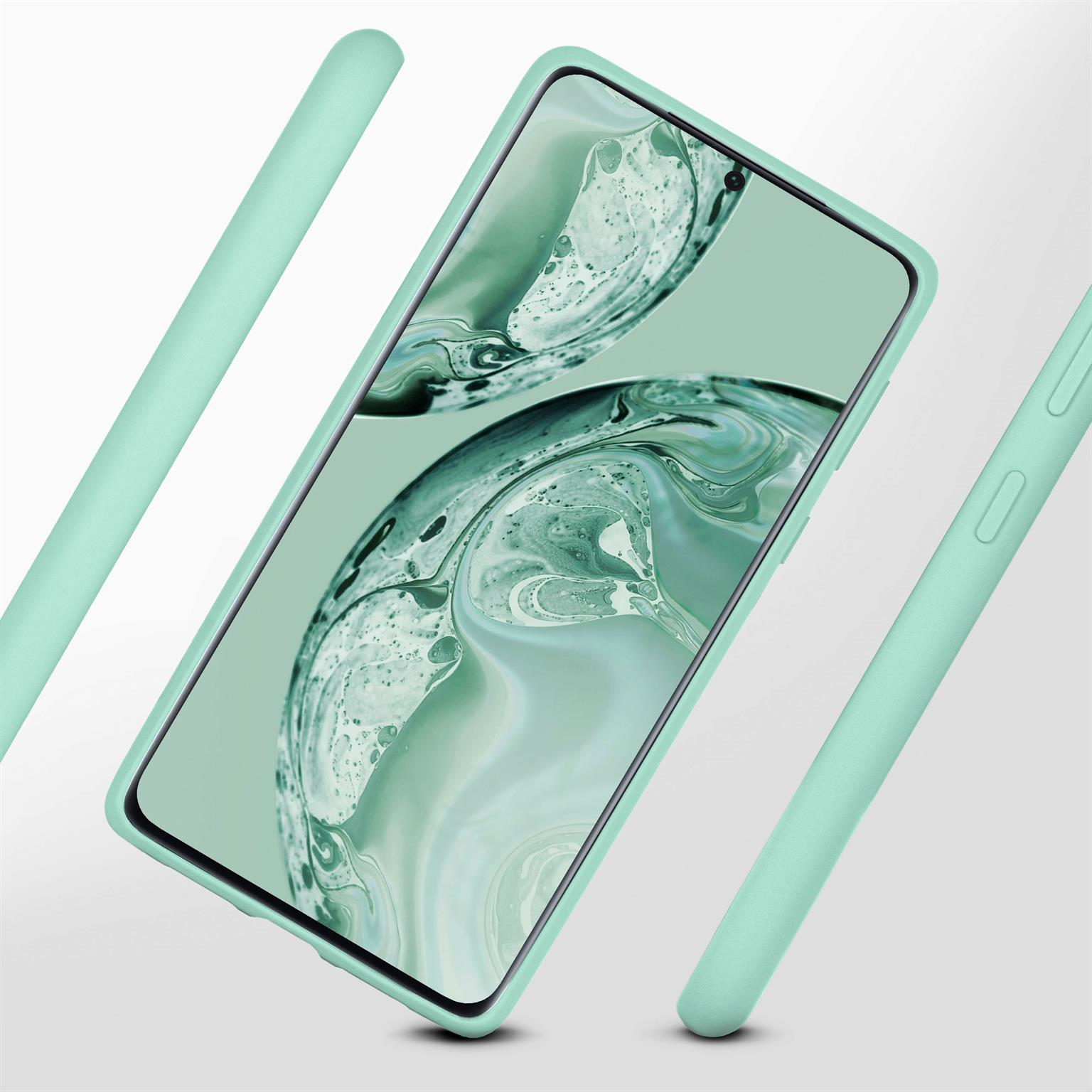 Ein Telefon in einer mintgrünen Hülle. Das Gehäuse umgibt das Telefon.