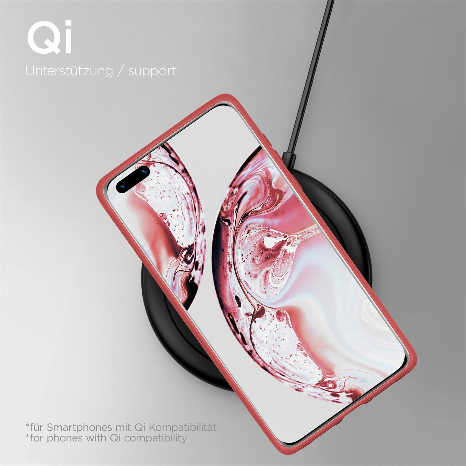 Ein rotes Smartphone mit Qi-Ladefunktion auf einer schwarzen Ladestation.