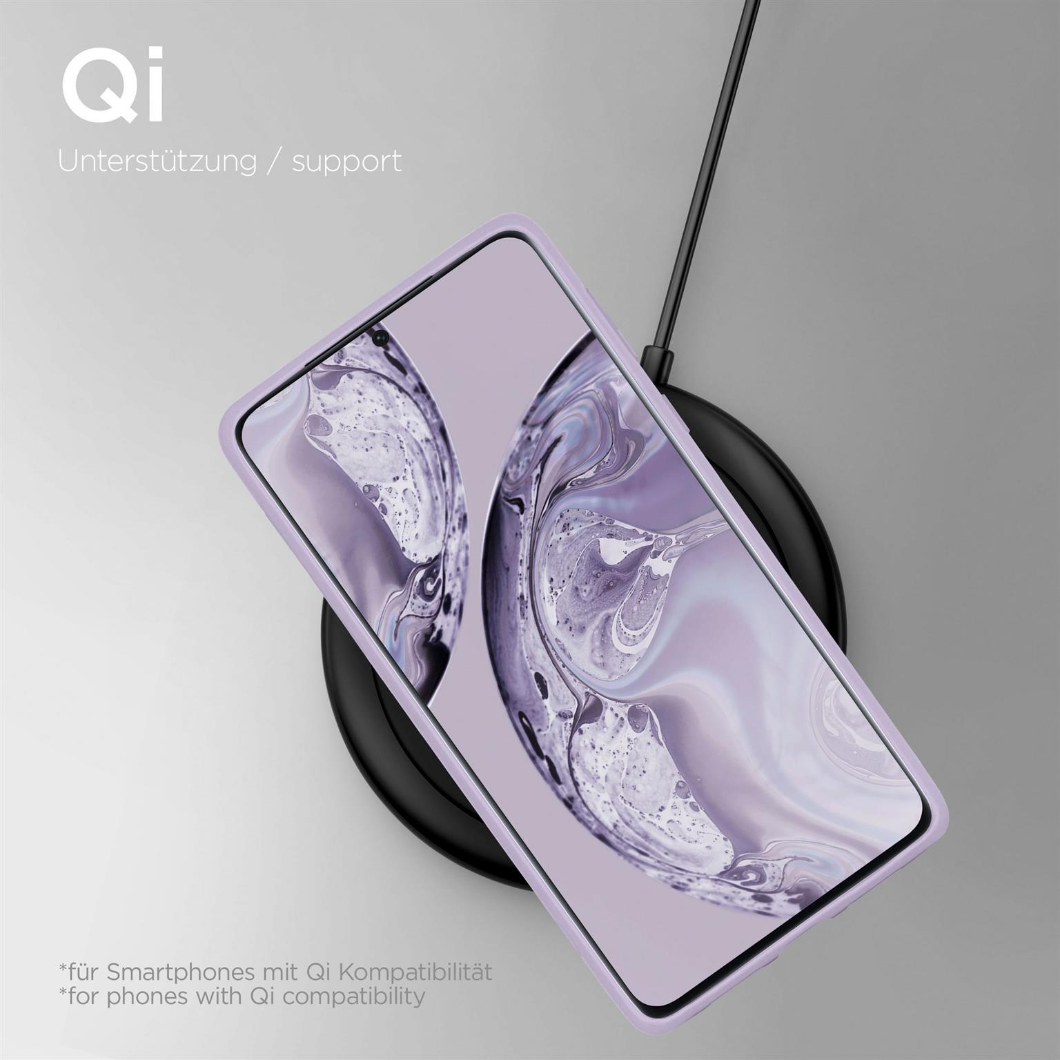 Lila Handyhülle auf kabellosem Ladegerät, mit Text 'Qi' und 'Support'.
