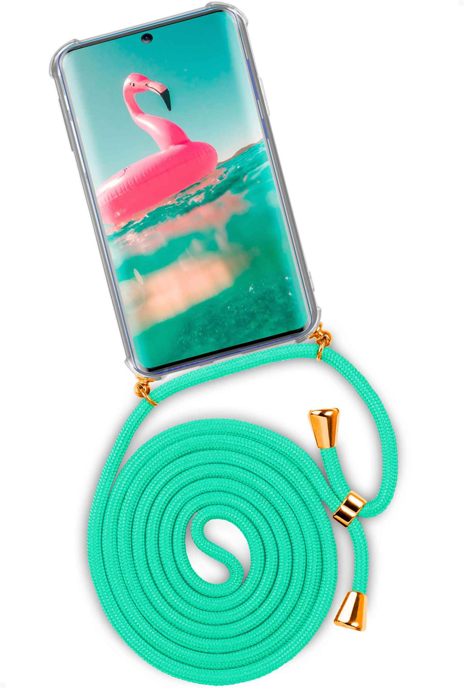 Telefon mit Flamingo-Bild, grünem Band, goldenen Akzenten. Weißer Hintergrund.