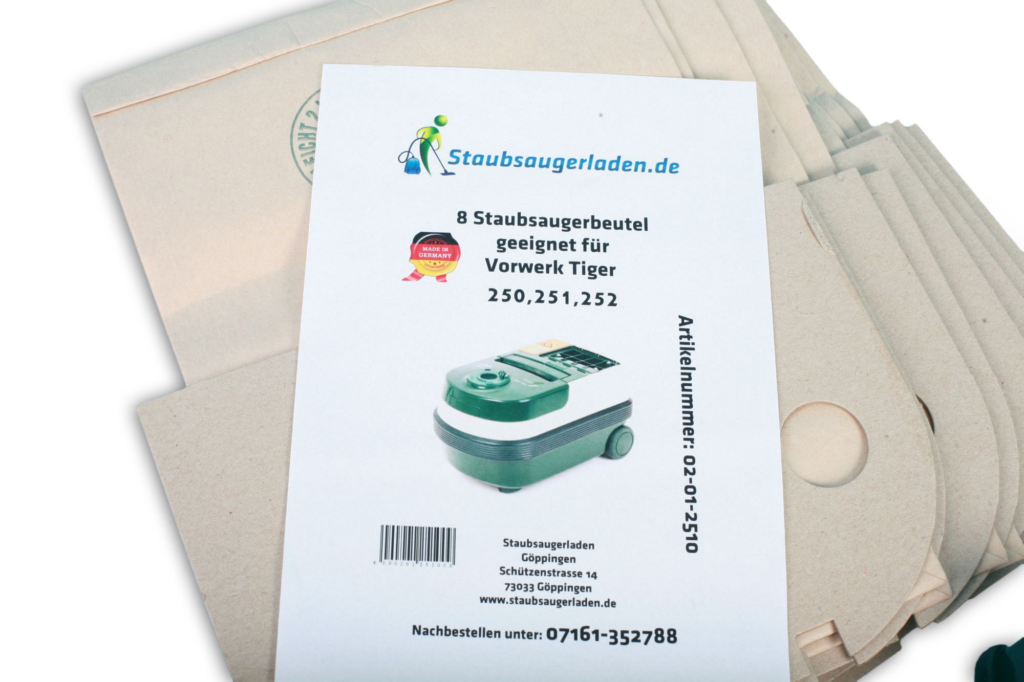 Staubsaugerbeutel und eine Verpackung mit Text und Staubsaugerbild.