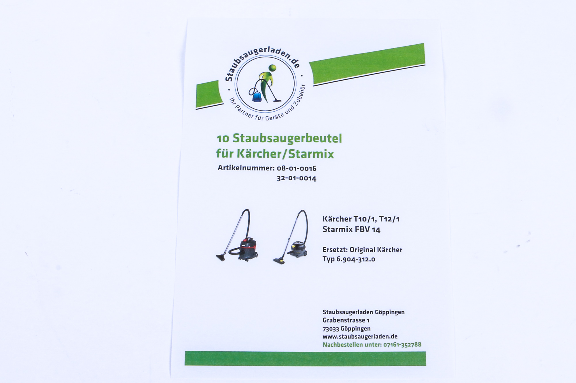 Papier mit Text über Staubsaugerbeutel, mit zwei Staubsaugergrafiken.