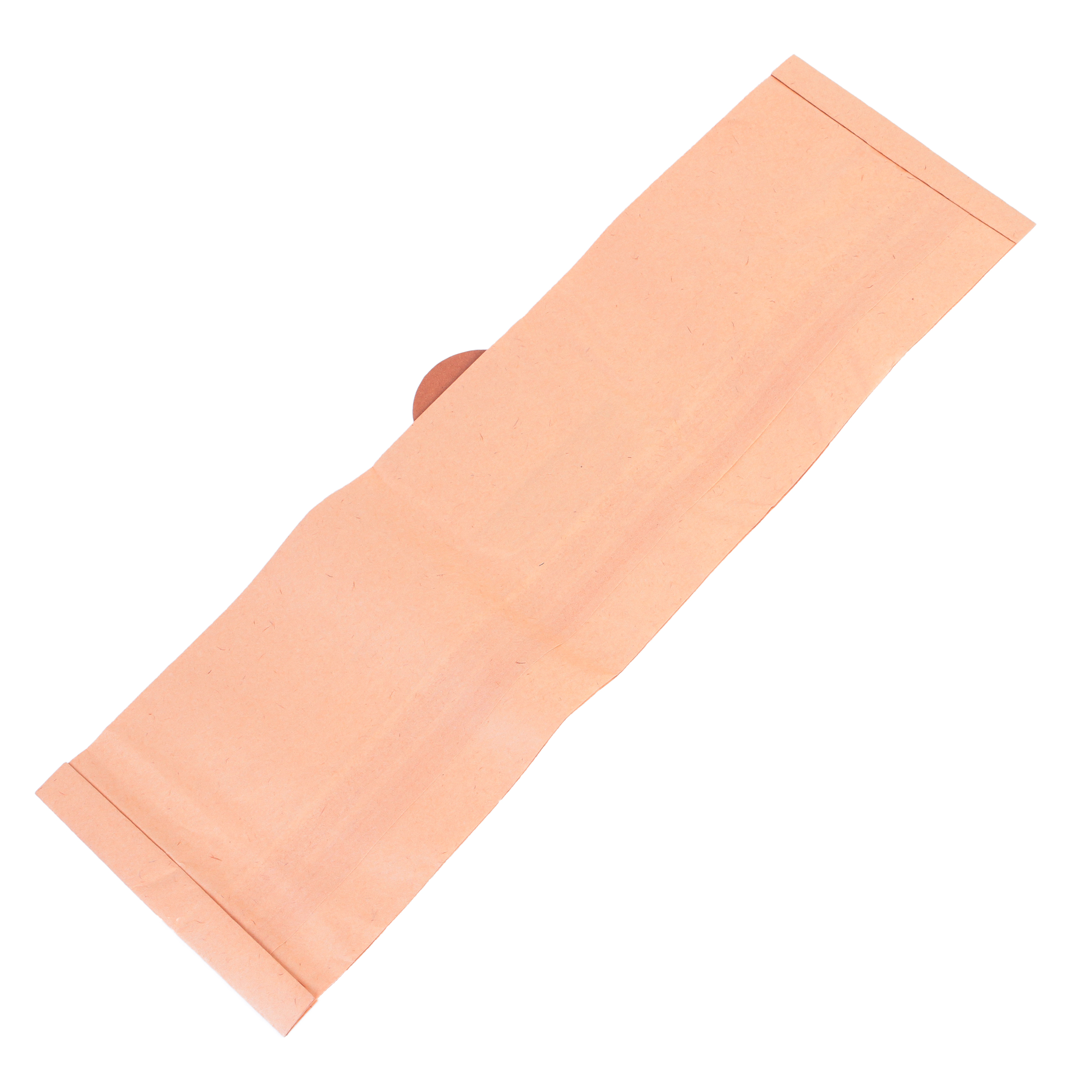 Ein pfirsichfarbenes Papier, leicht gebogen, liegt auf weißem Hintergrund.