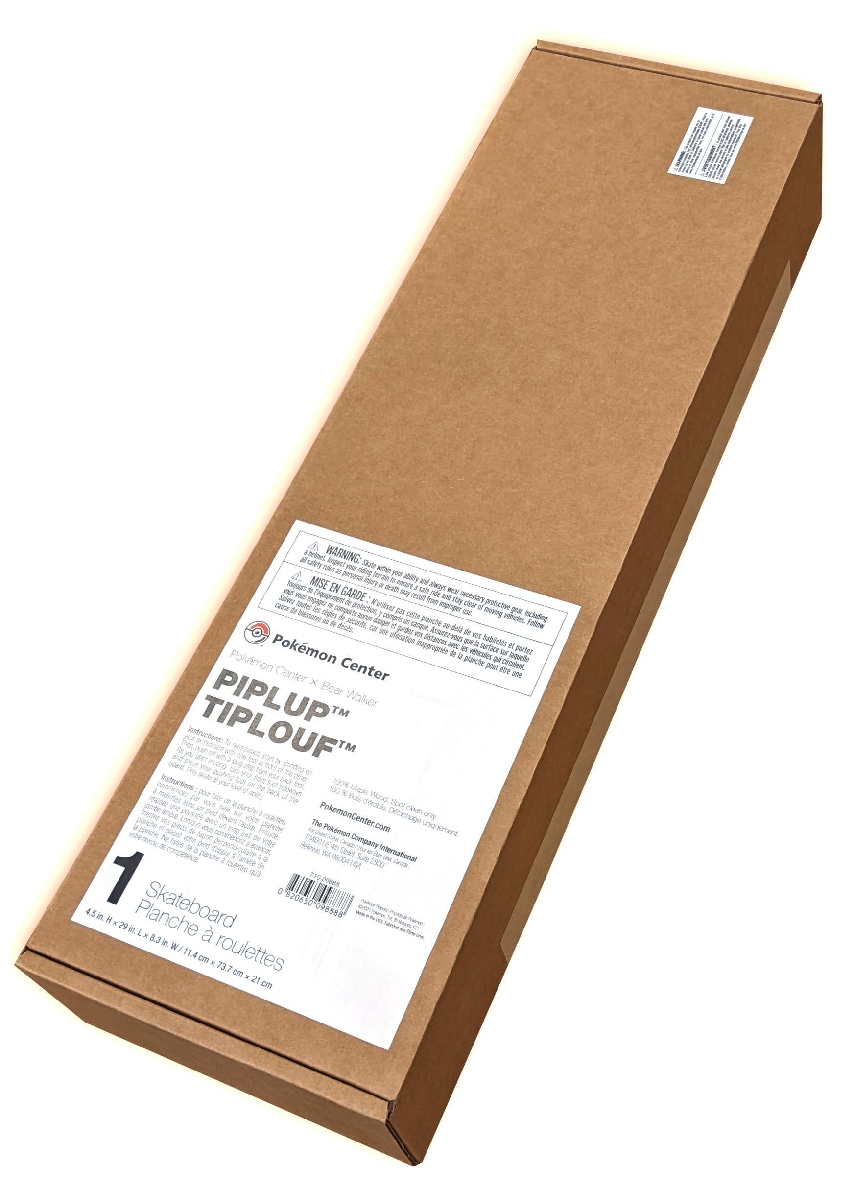Eine lange braune Pappschachtel mit Text und Logos. Die Box ist angewinkelt.