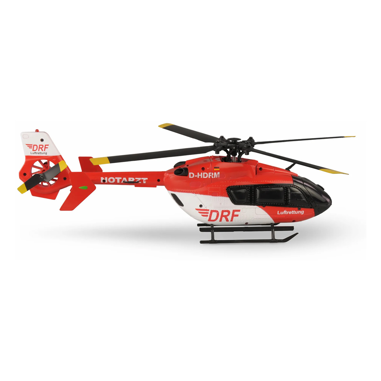 Modelo de helicóptero de rescate rojo sobre fondo blanco.