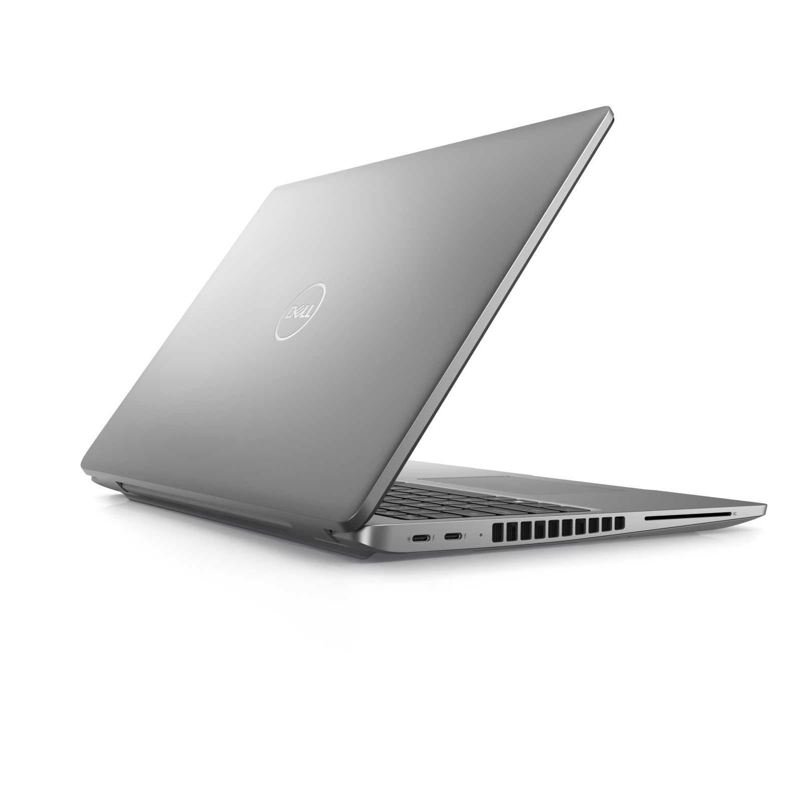 Laptop argentato con logo Dell, leggermente aperto, su sfondo bianco.