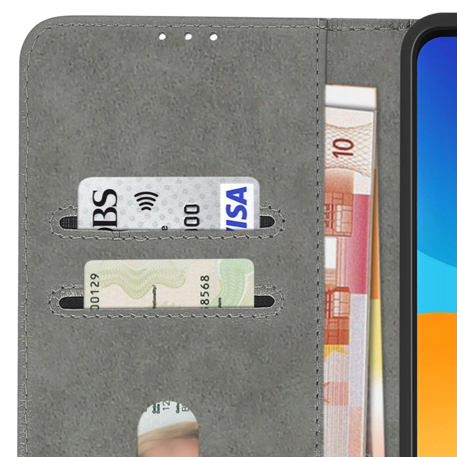 Un primo piano dell'interno di una custodia per telefono. Ci sono fessure per carte e un posto per le banconote.