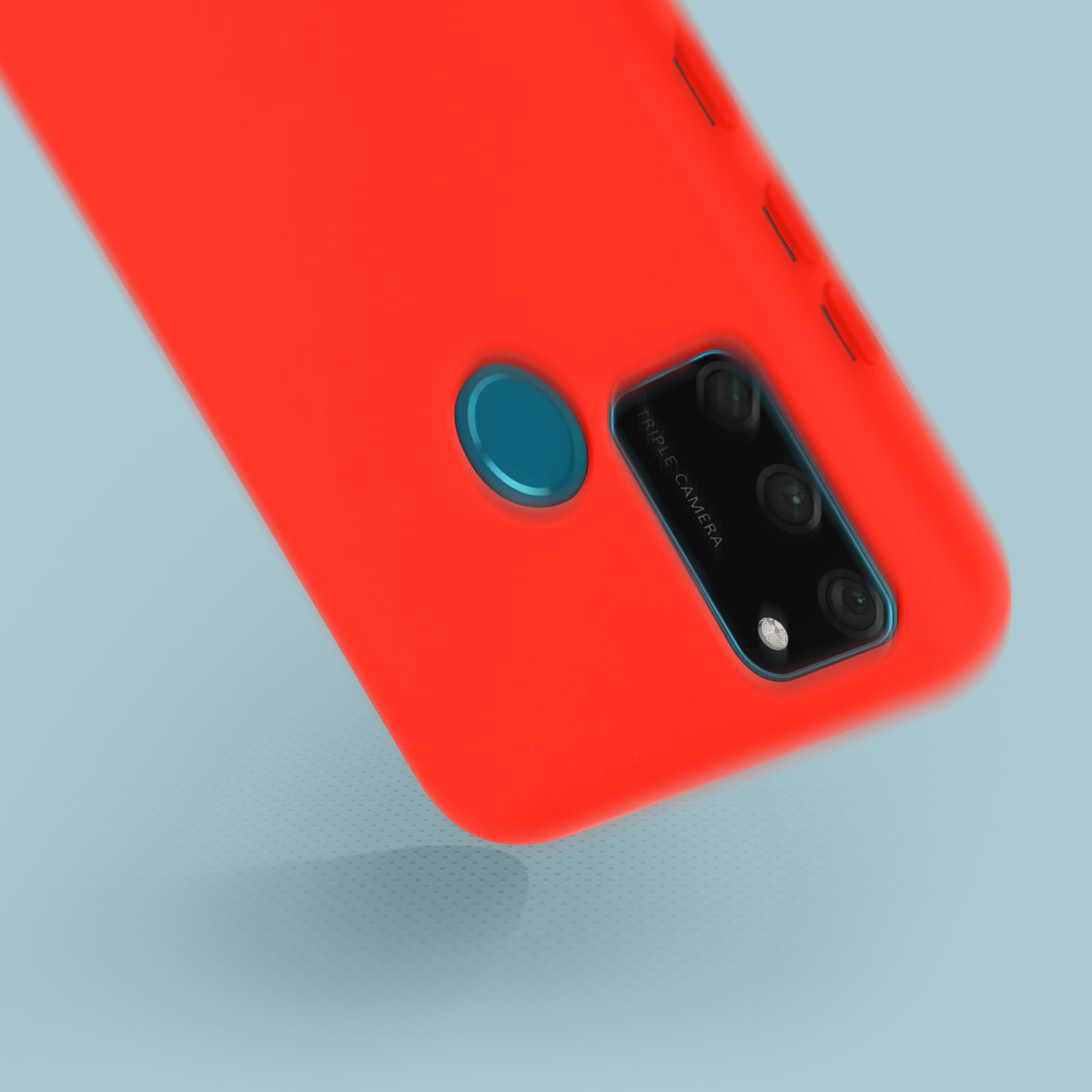 Custodia rossa per telefono con ritaglio per fotocamera, primo piano su superficie blu, che mostra la fotocamera.