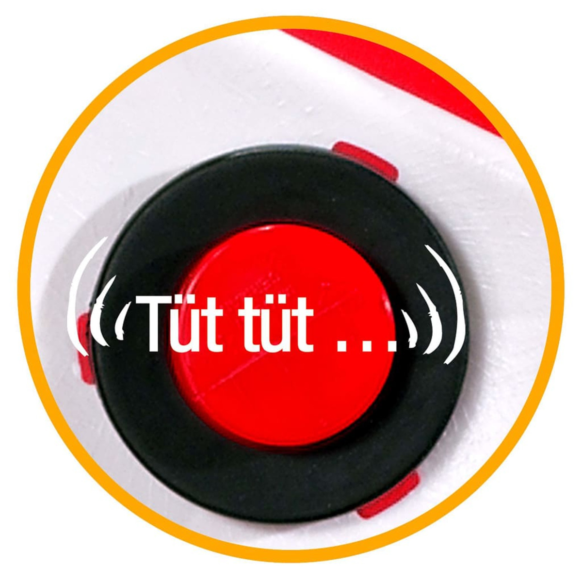 Primo piano di un pulsante rosso in un anello nero con testo effetto sonoro: ((Tüt tüt ...)).