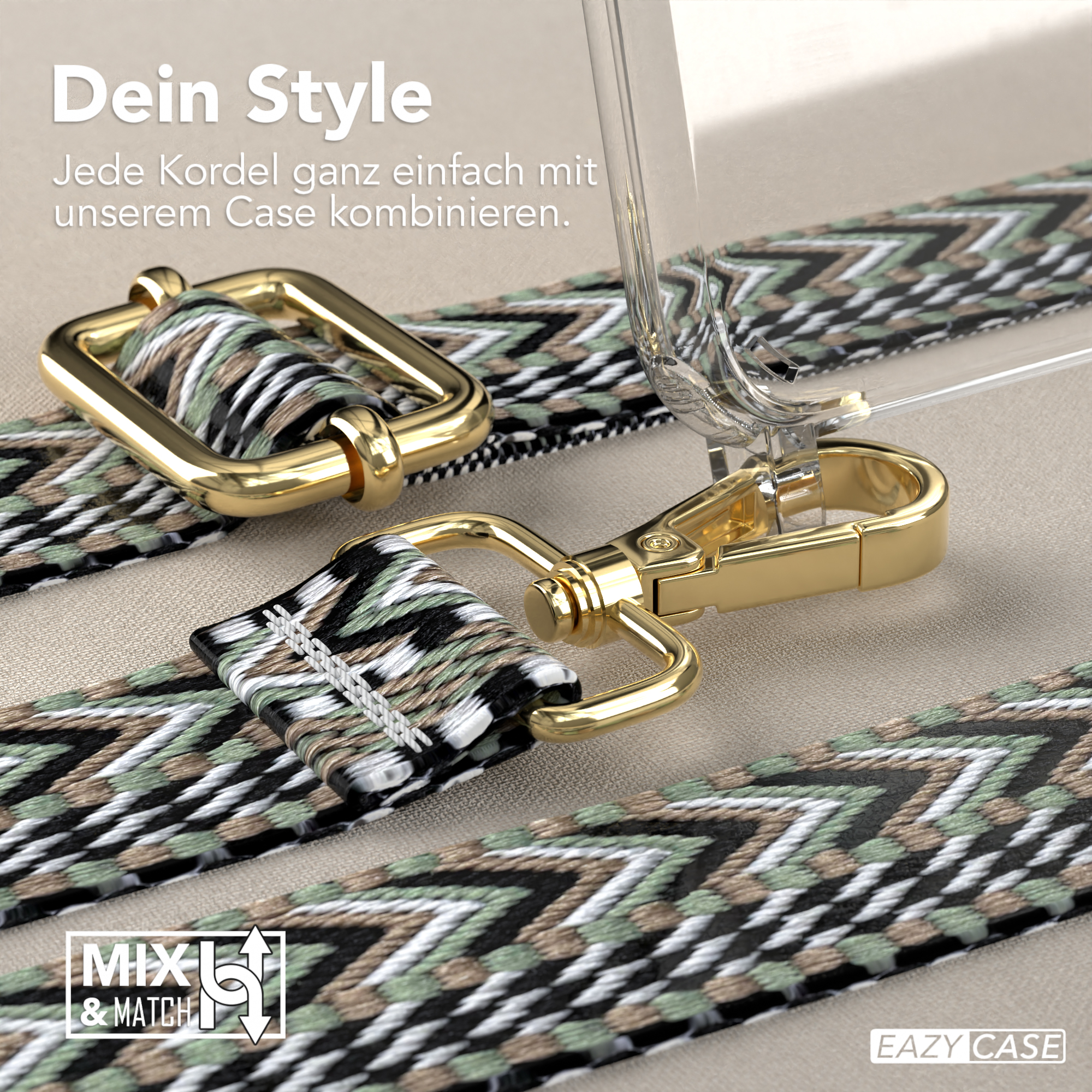 Nahaufnahme eines Handyhüllenriemens und -clips. Der Riemen ist gemustert. Der Clip ist goldfarben. Die Wörter MIX & MATCH sind sichtbar.