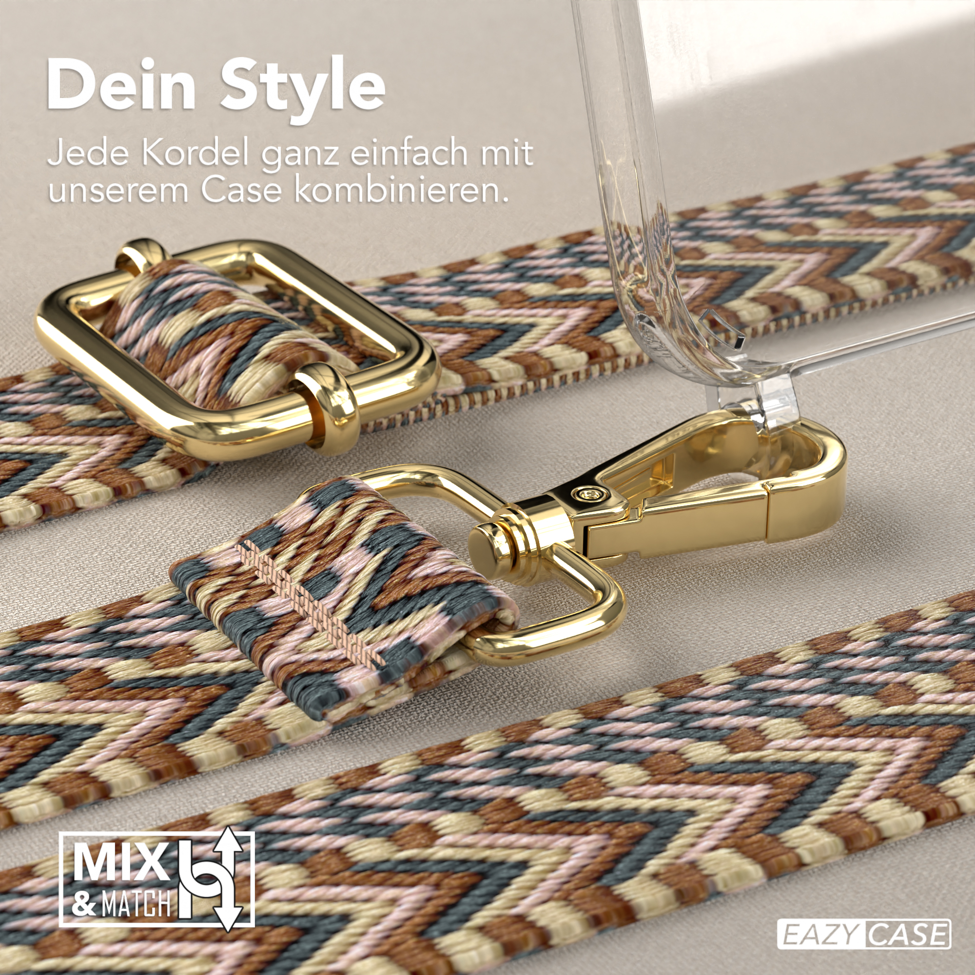 Nahaufnahme von Handyrriemen und -hülle. Goldfarbene Metallbeschläge und gemusterter Riemen sichtbar.