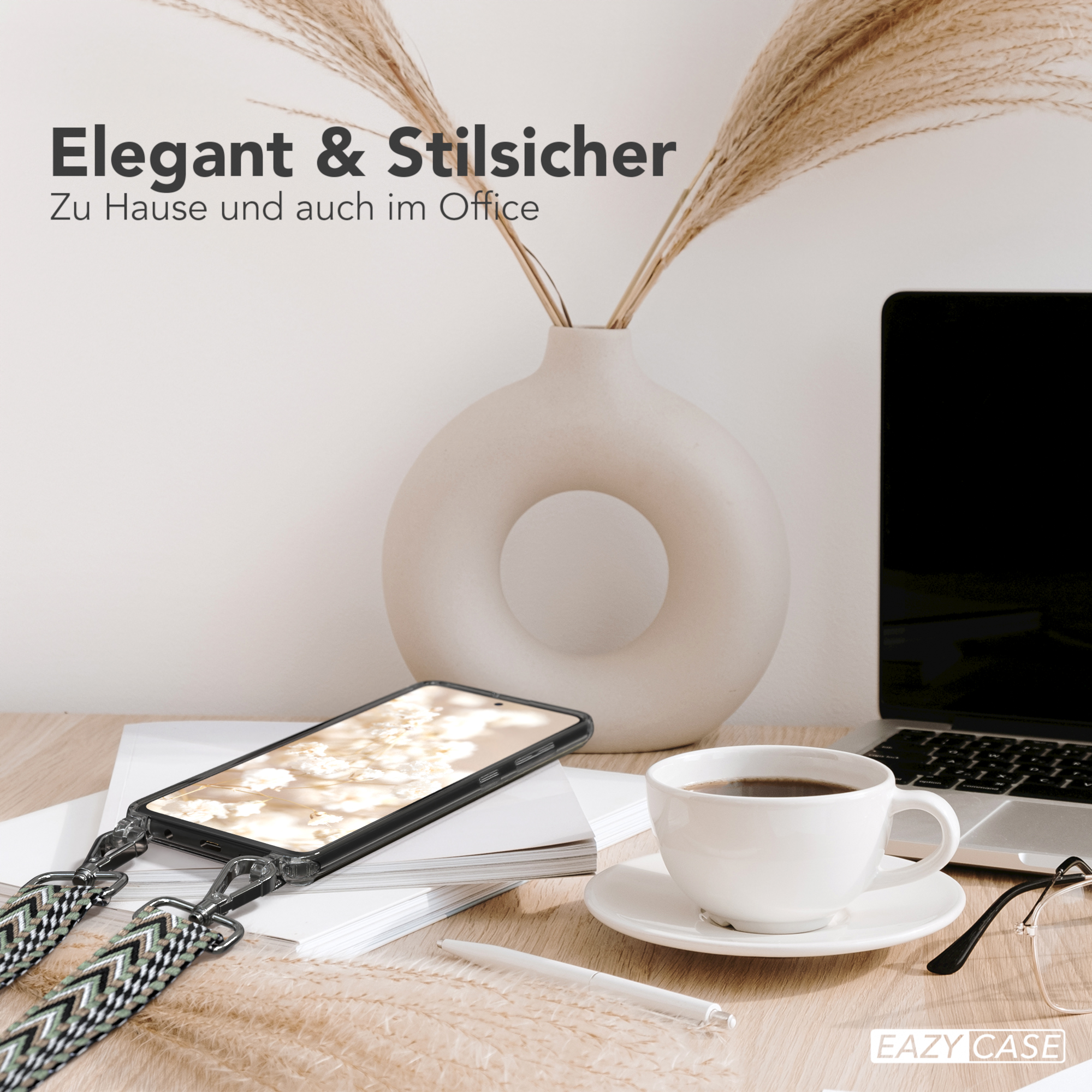 Telefon auf dem Schreibtisch mit Kaffeetasse und Vase. Text: Elegant & stilsicher. Für Zuhause und Büro.