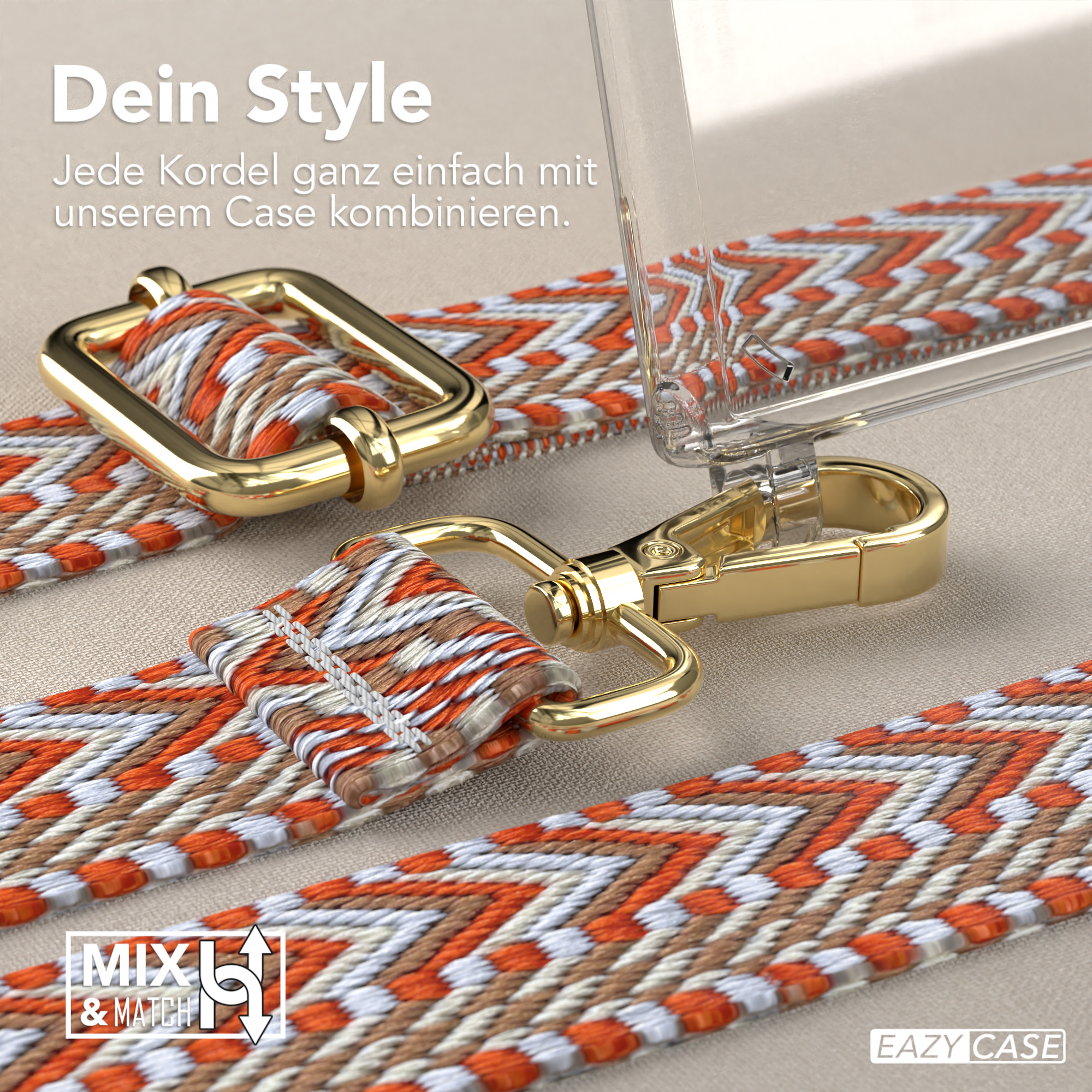 Nahaufnahme einer transparenten Handyhülle mit einem orangefarbenen und weiß gemusterten Handystrap. Goldene Hardware.