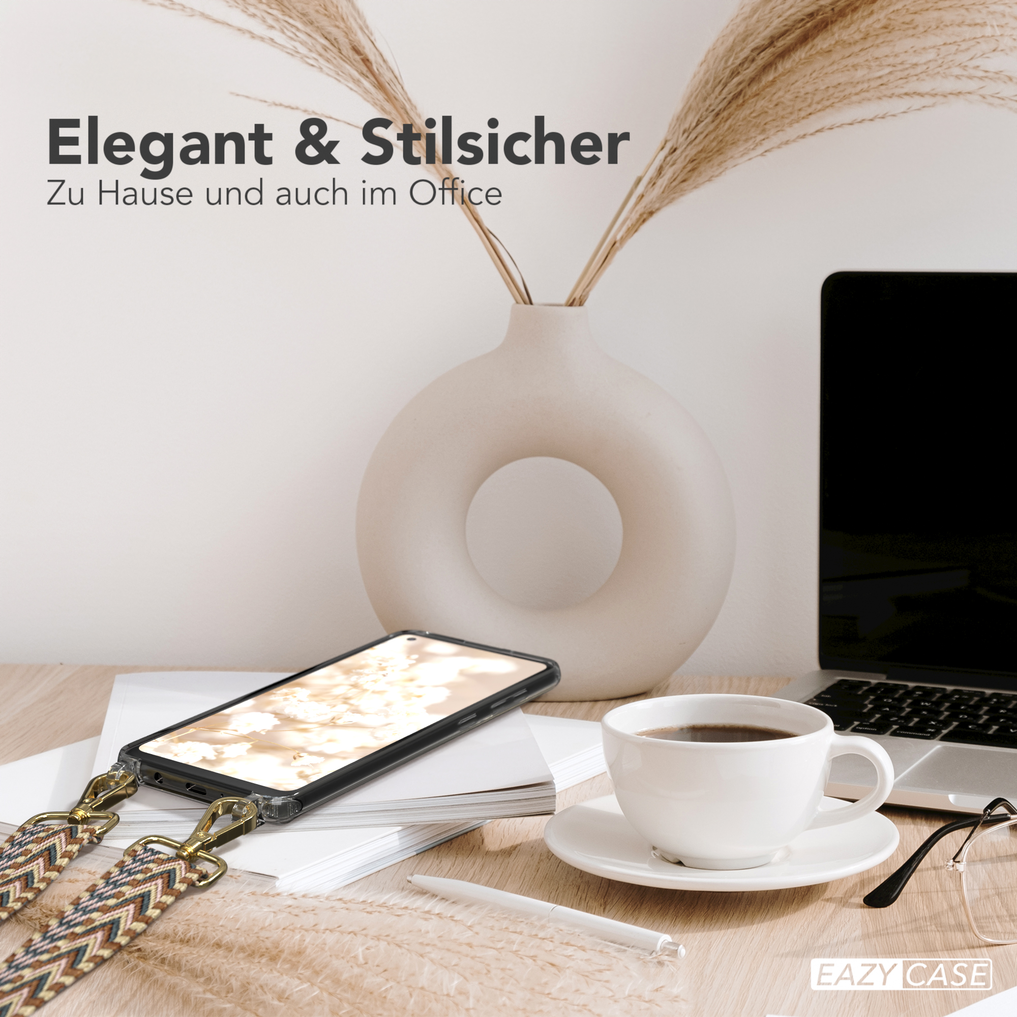 Handyhülle auf einem Schreibtisch mit einer Kaffeetasse, einem Stift und einem Laptop.