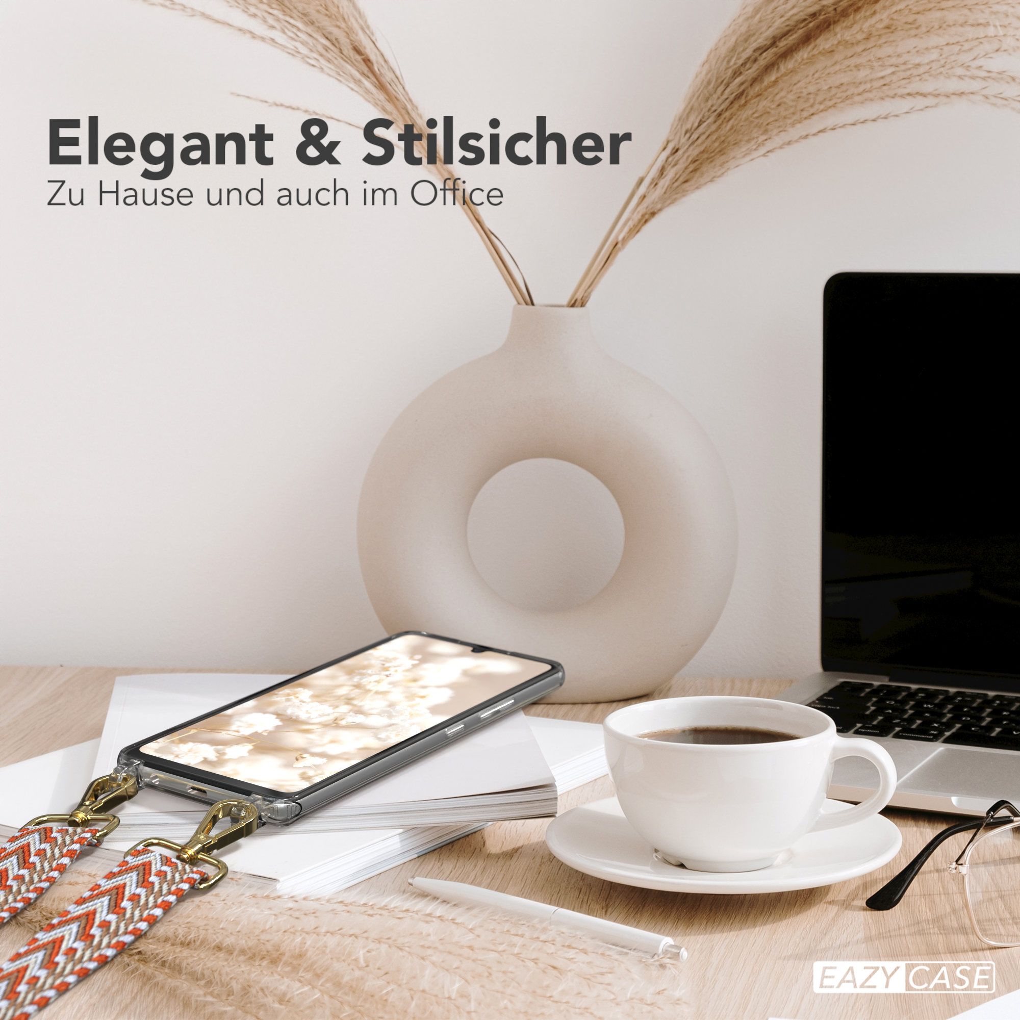 Schreibtisch mit Telefon, Kaffee und Laptop. Beige Vase mit Pflanzen. Text: Elegant & Stilvoll.
