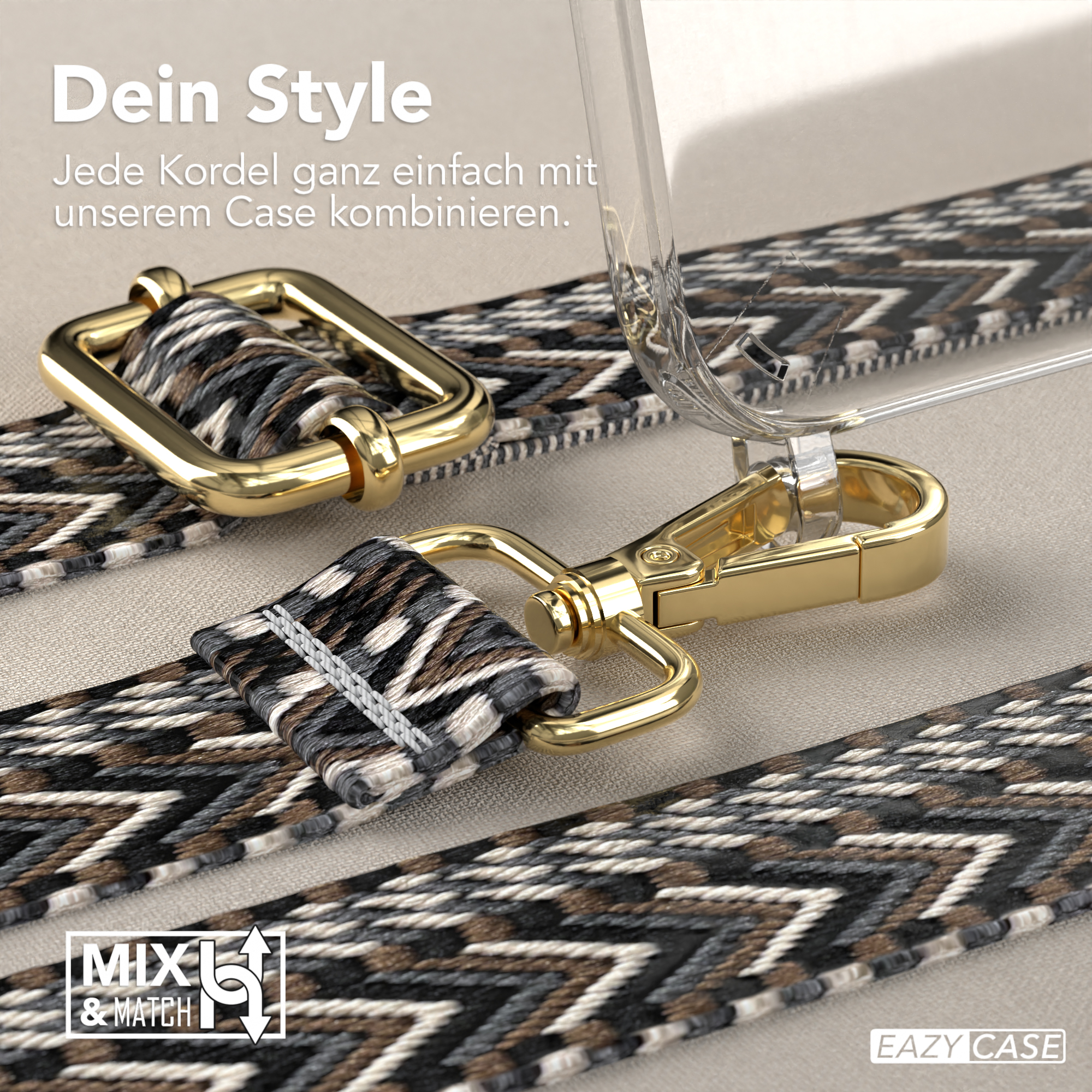 Nahaufnahme einer Handyhülle mit gemustertem Gurt und goldfarbenen Metallteilen, auf hellem Hintergrund.