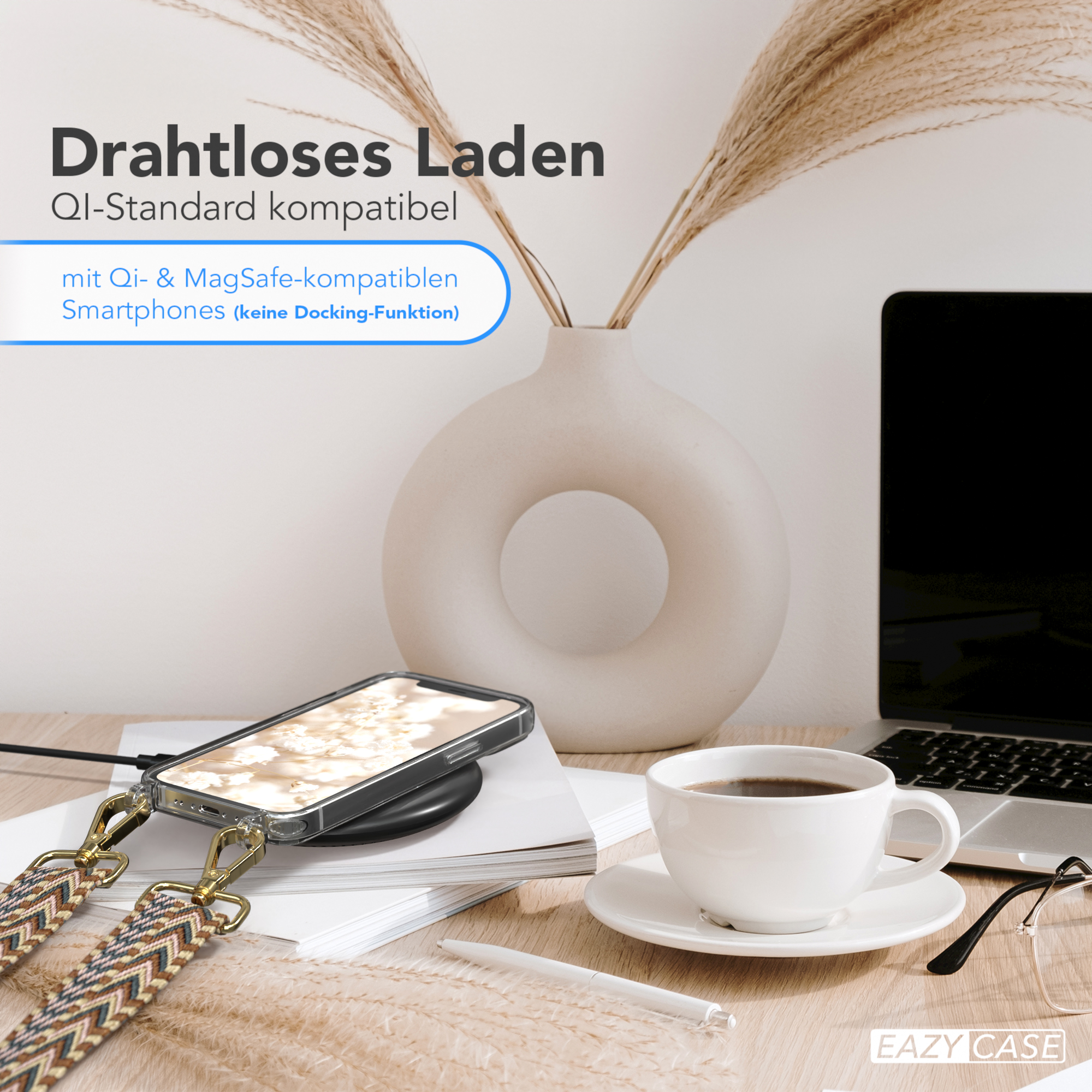 Telefon auf kabellosem Ladegerät mit Blumen und Kaffeetasse. Text: Kabelloses Laden.
