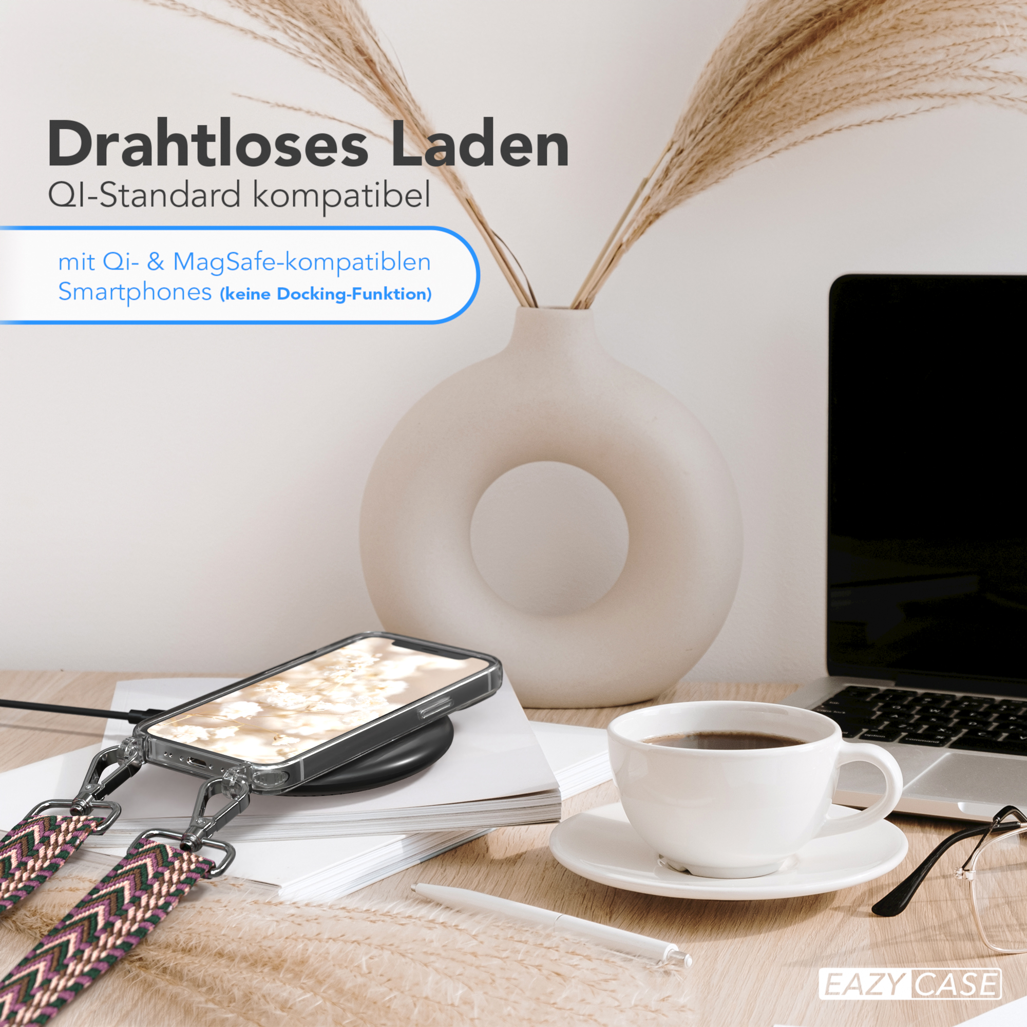 Telefon lädt kabellos. Telefon ist an einem Gurt befestigt. Eine Tasse Kaffee ist vorhanden.