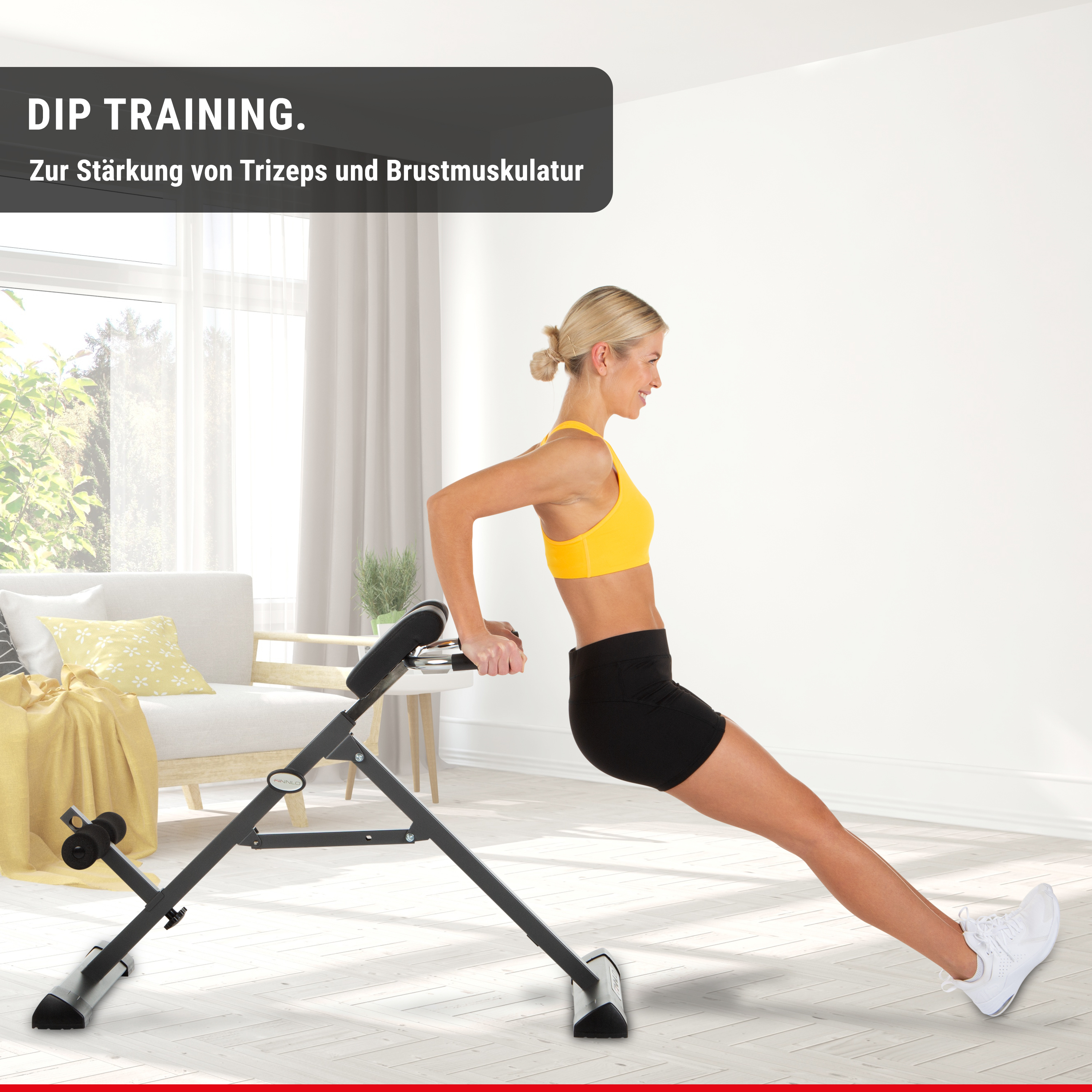 Frau beim Dip-Training. Sie trainiert drinnen an einer Dip-Maschine in Schwarz und Silber.